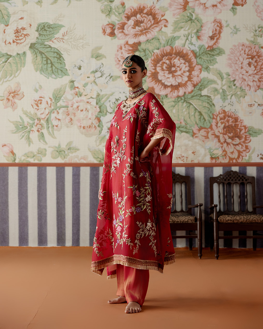 A model showcasing Maroon Kaftan Kurta Set by Pooja Singhal from Pooja Singhal's collection
