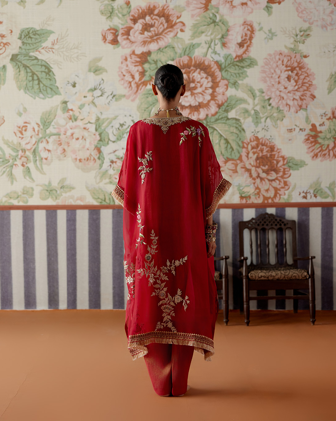 A model showcasing Maroon Kaftan Kurta Set by Pooja Singhal from Pooja Singhal's collection