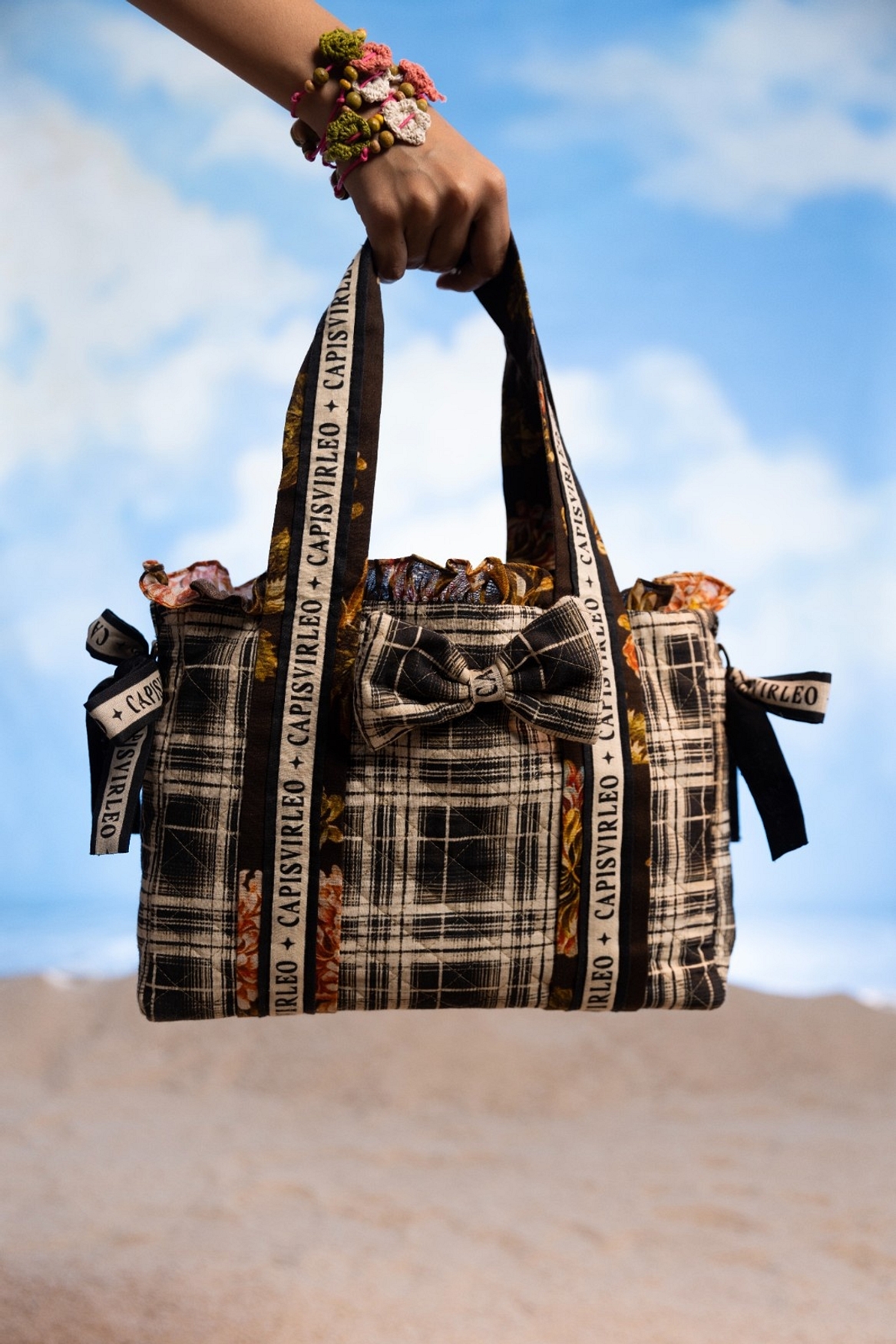 A model showcasing Black Baga Bag Feature image by Capisvirleo from Capisvirleo's collection