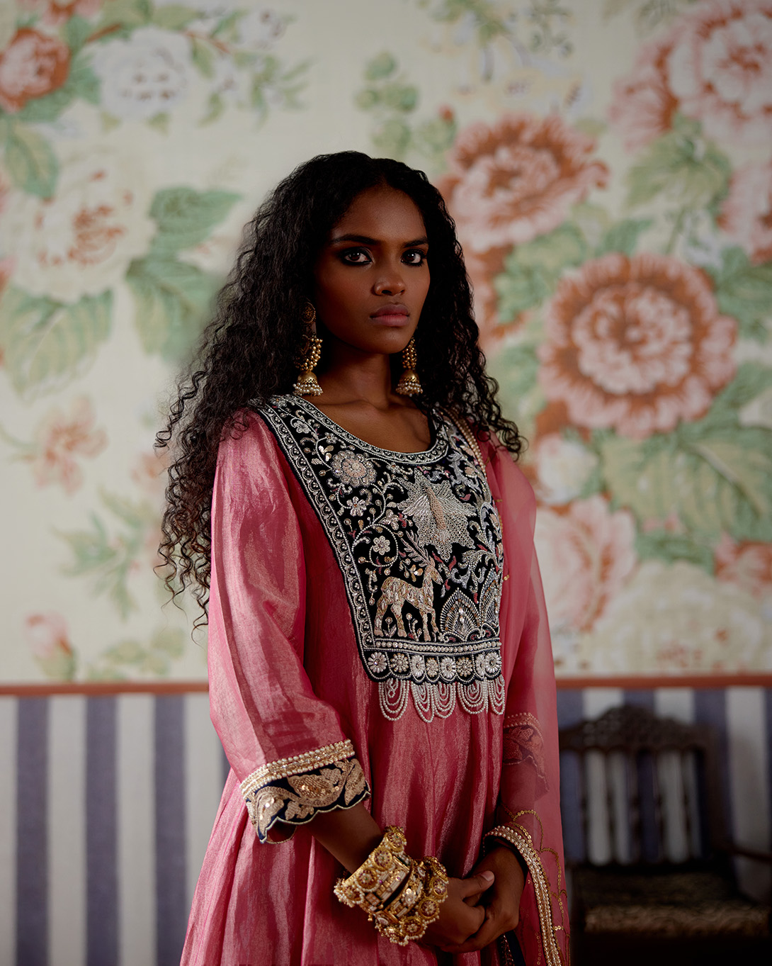 A model showcasing Pink Tissue And Velvet Anarkali Set by Pooja Singhal from Pooja Singhal's collection
