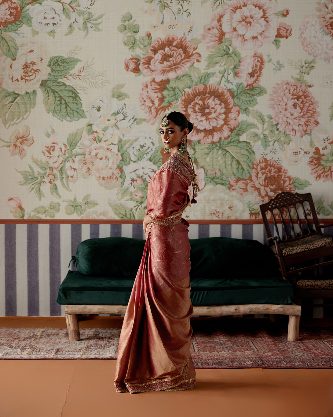 A model showcasing Maroon Banarasi Tissue Saree by Pooja Singhal from Pooja Singhal's collection