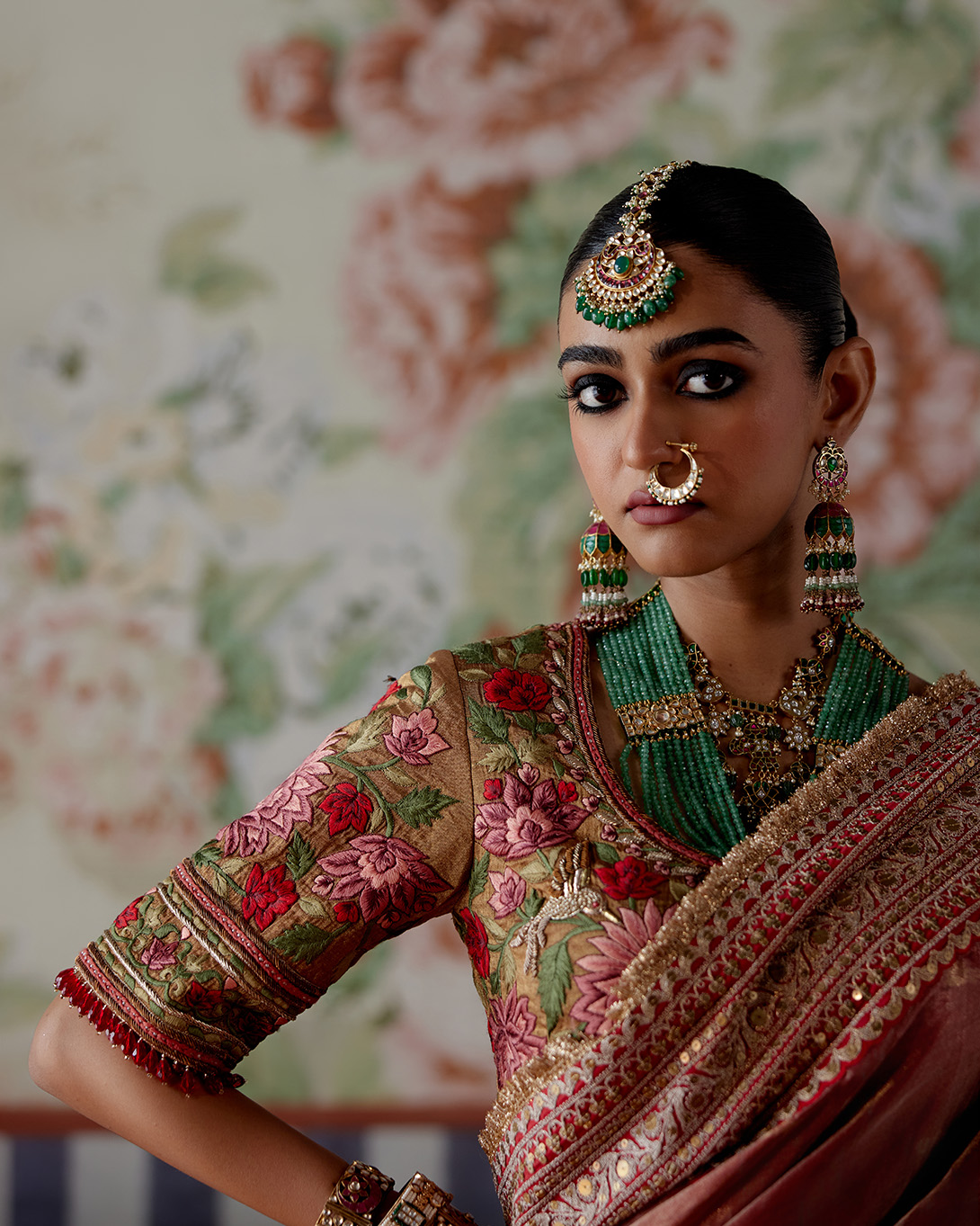 A model showcasing Maroon Banarasi Tissue Saree by Pooja Singhal from Pooja Singhal's collection