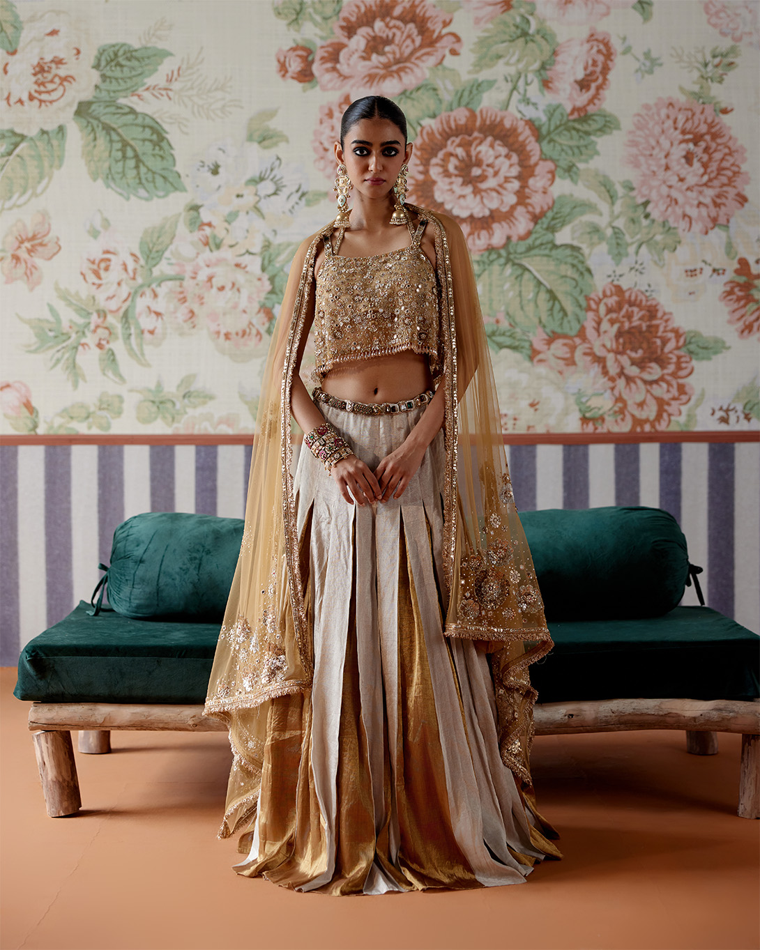 A model showcasing Silver And Gold Lehenga Set by Pooja Singhal from Pooja Singhal's collection