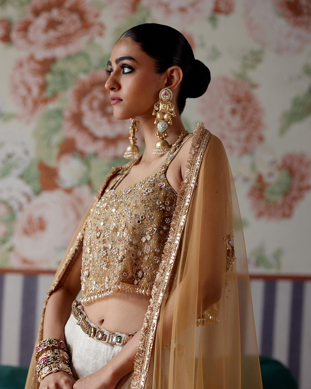 A model showcasing Silver And Gold Lehenga Set by Pooja Singhal from Pooja Singhal's collection
