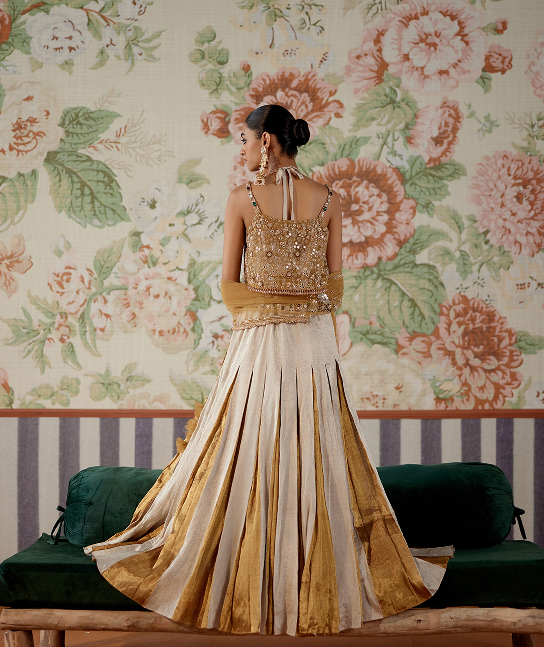 A model showcasing Silver And Gold Lehenga Set by Pooja Singhal from Pooja Singhal's collection