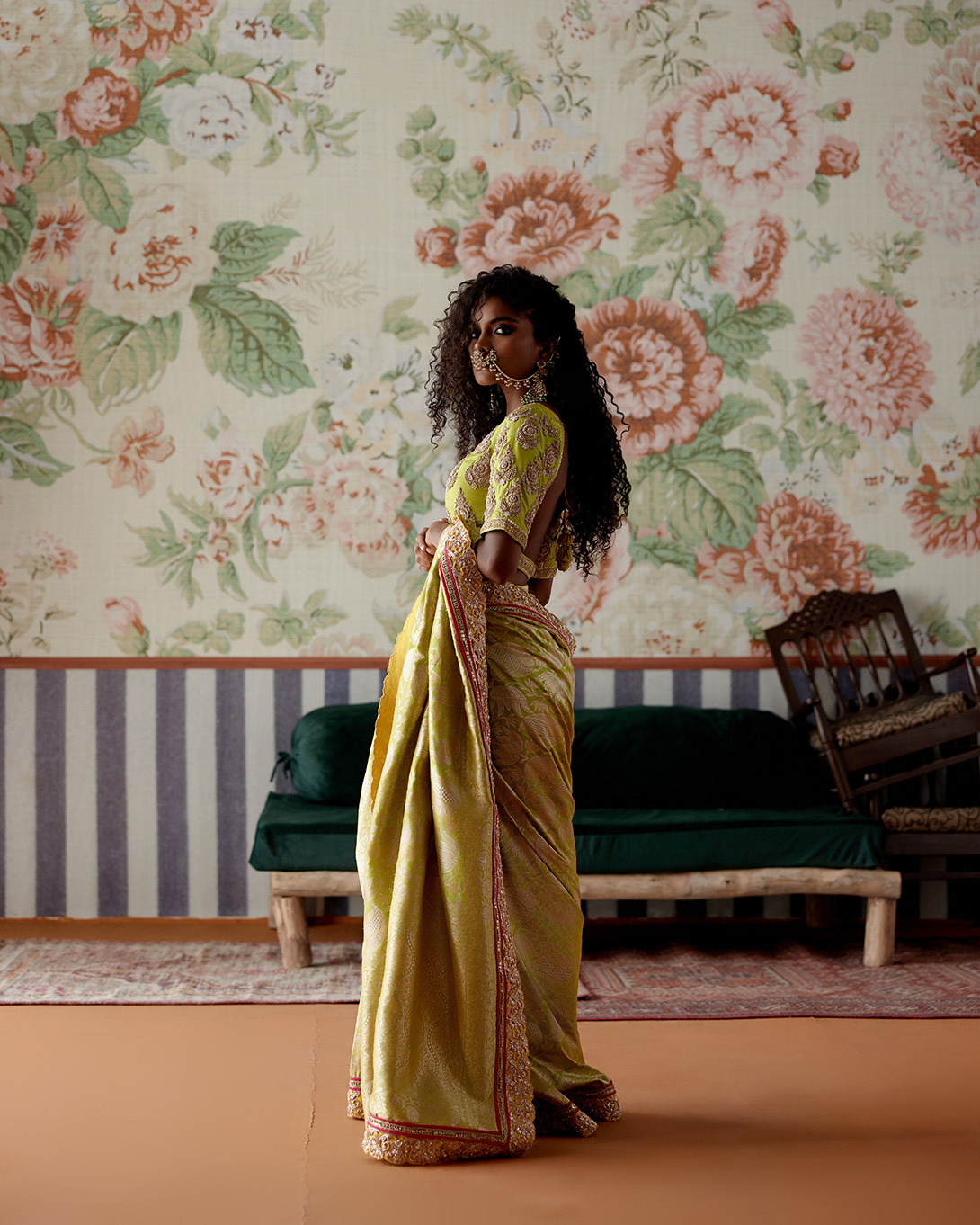 A model showcasing Green Banarasi Silk Saree by Pooja Singhal from Pooja Singhal's collection