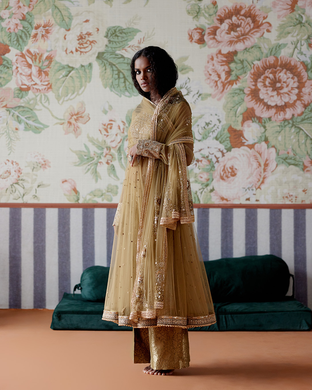 A model showcasing Olive Green Gold Anarkali Set by Pooja Singhal from Pooja Singhal's collection