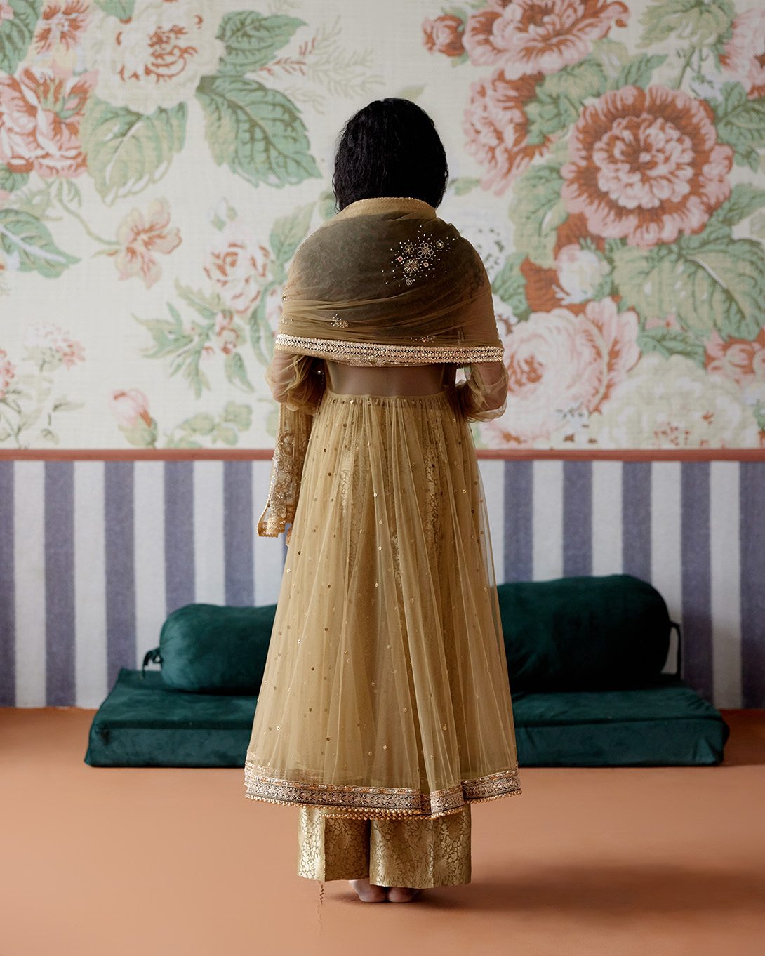 A model showcasing Olive Green Gold Anarkali Set by Pooja Singhal from Pooja Singhal's collection