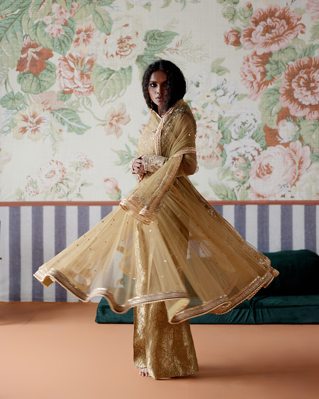 A model showcasing Olive Green Gold Anarkali Set by Pooja Singhal from Pooja Singhal's collection