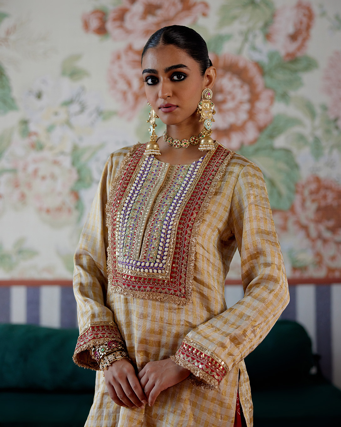 A model showcasing Gold And Red Kurta With Dhoti Pants by Pooja Singhal from Pooja Singhal's collection