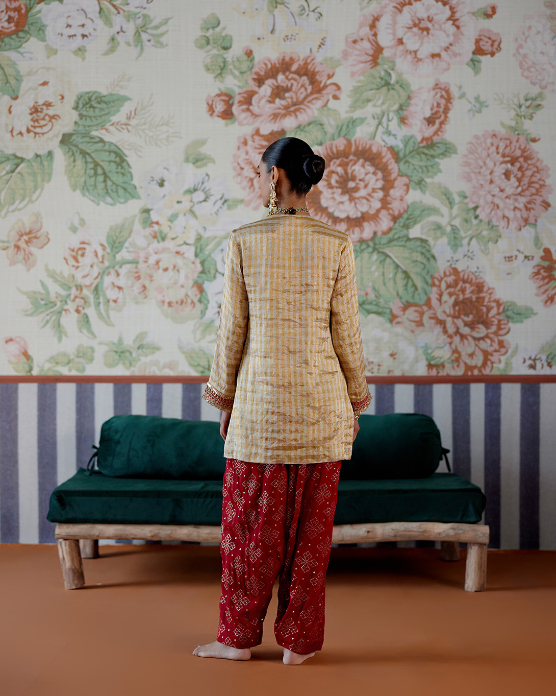 A model showcasing Gold And Red Kurta With Dhoti Pants by Pooja Singhal from Pooja Singhal's collection