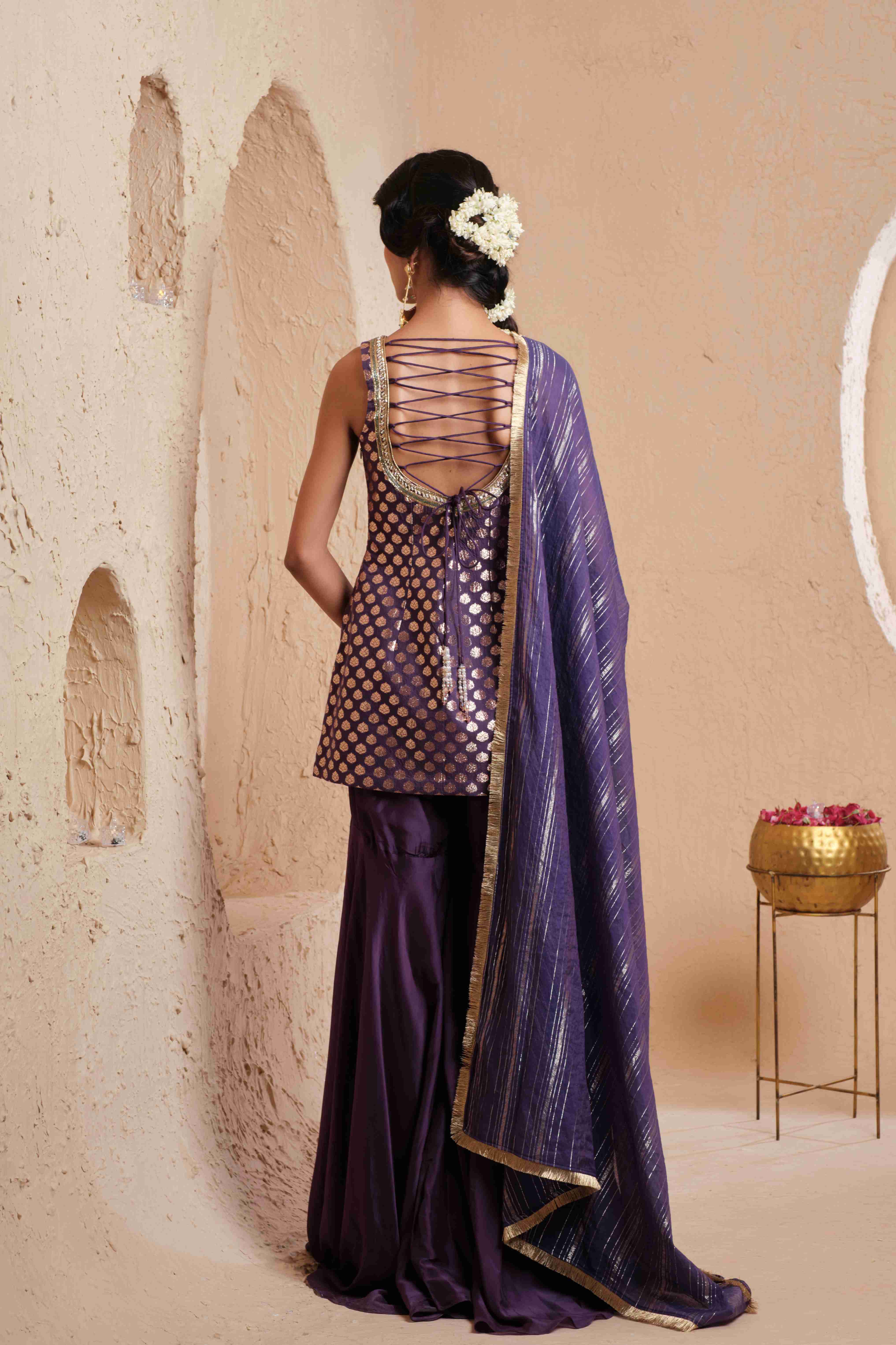 A model showcasing Vanya Deep Violet Garara Set by Muditaa By Urmila from Muditaa By Urmila's collection