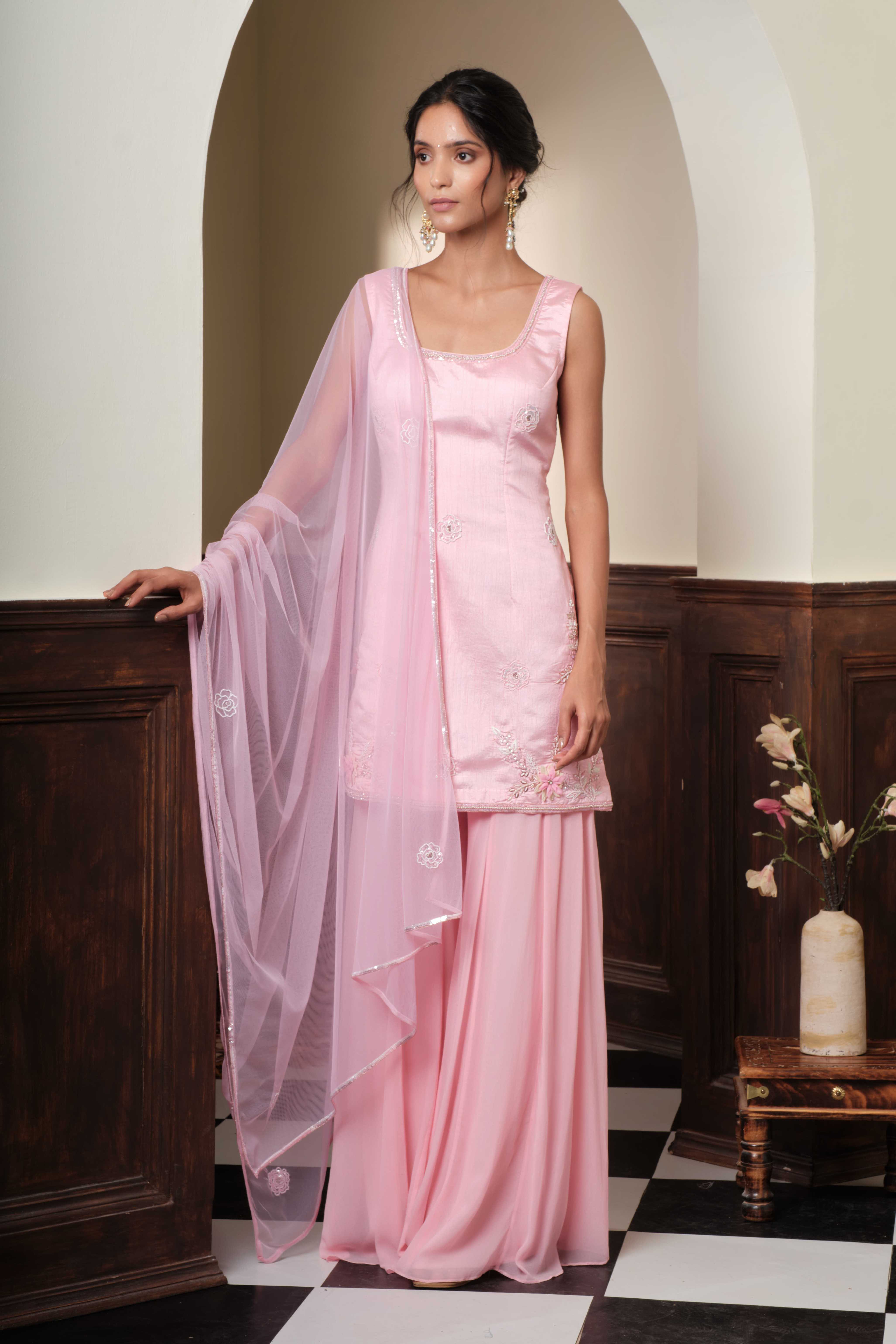 A model showcasing Rohi 3d Floral Sharara Set by Muditaa By Urmila from Muditaa By Urmila's collection
