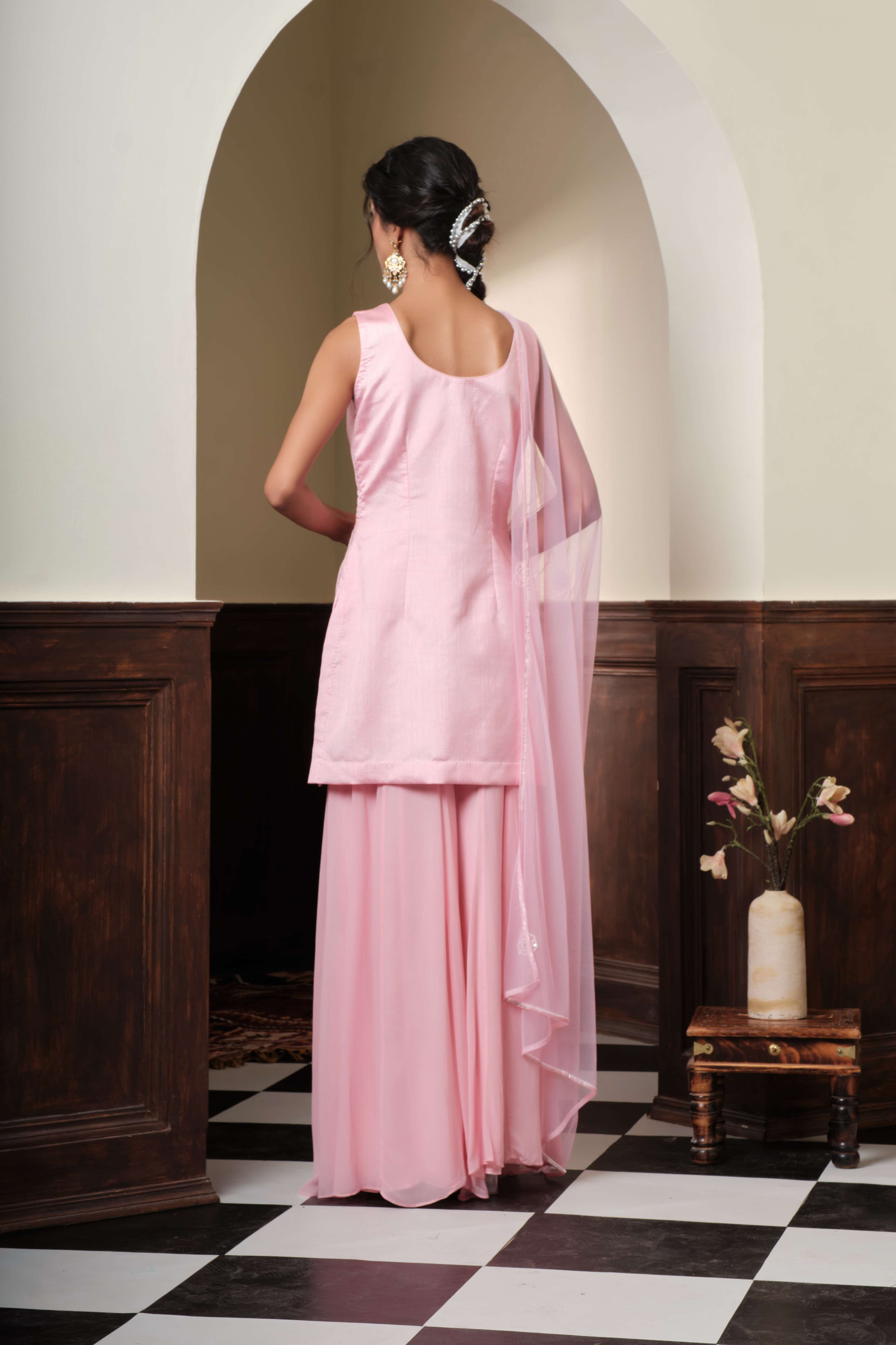 A model showcasing Rohi 3d Floral Sharara Set by Muditaa By Urmila from Muditaa By Urmila's collection