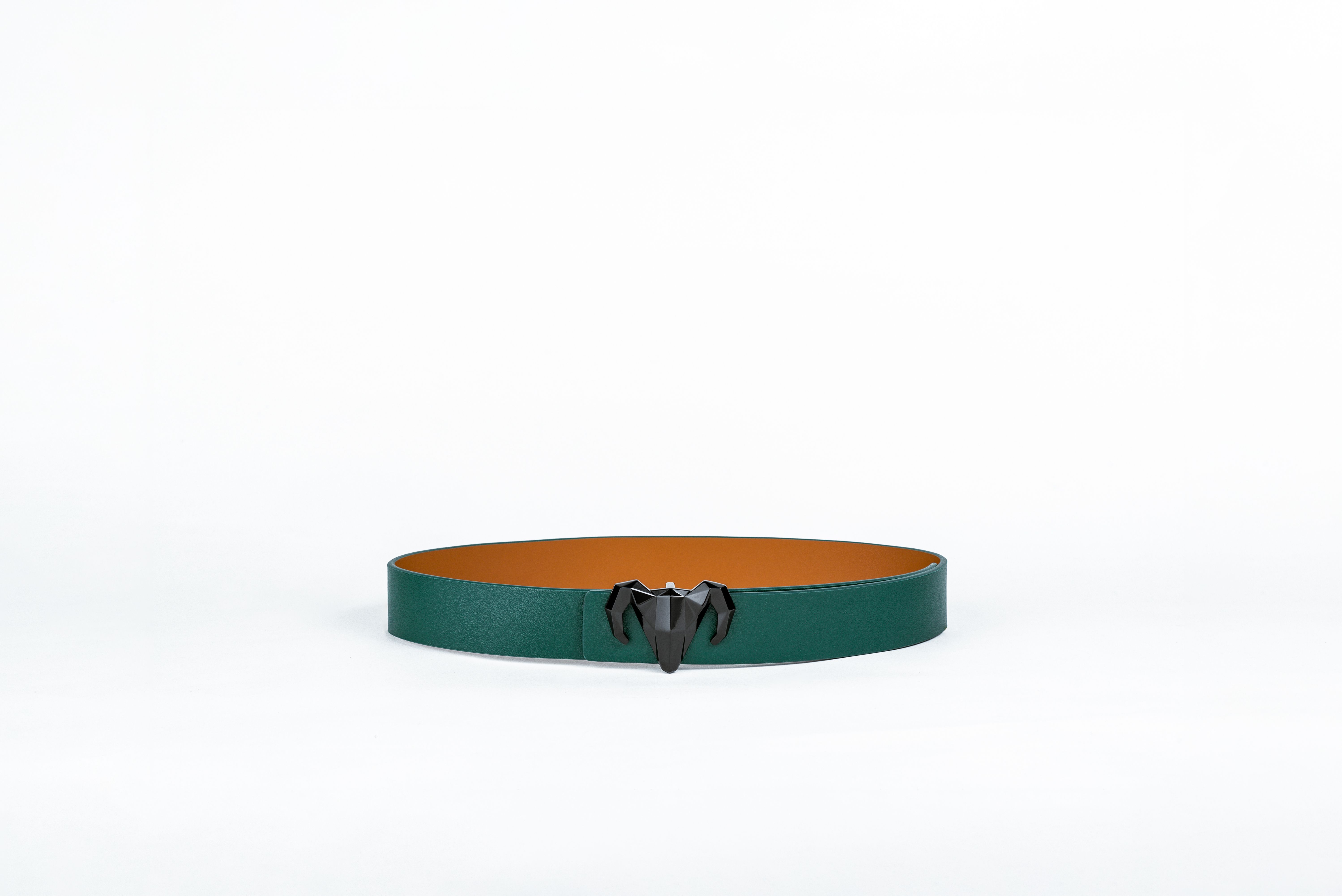 A model showcasing Italian Leather Green And Brown Reversible Belt by Dusala from Dusala's collection A model showcasing Italian Leather Green And Brown Reversible Belt by Dusala from Dusala's collection
