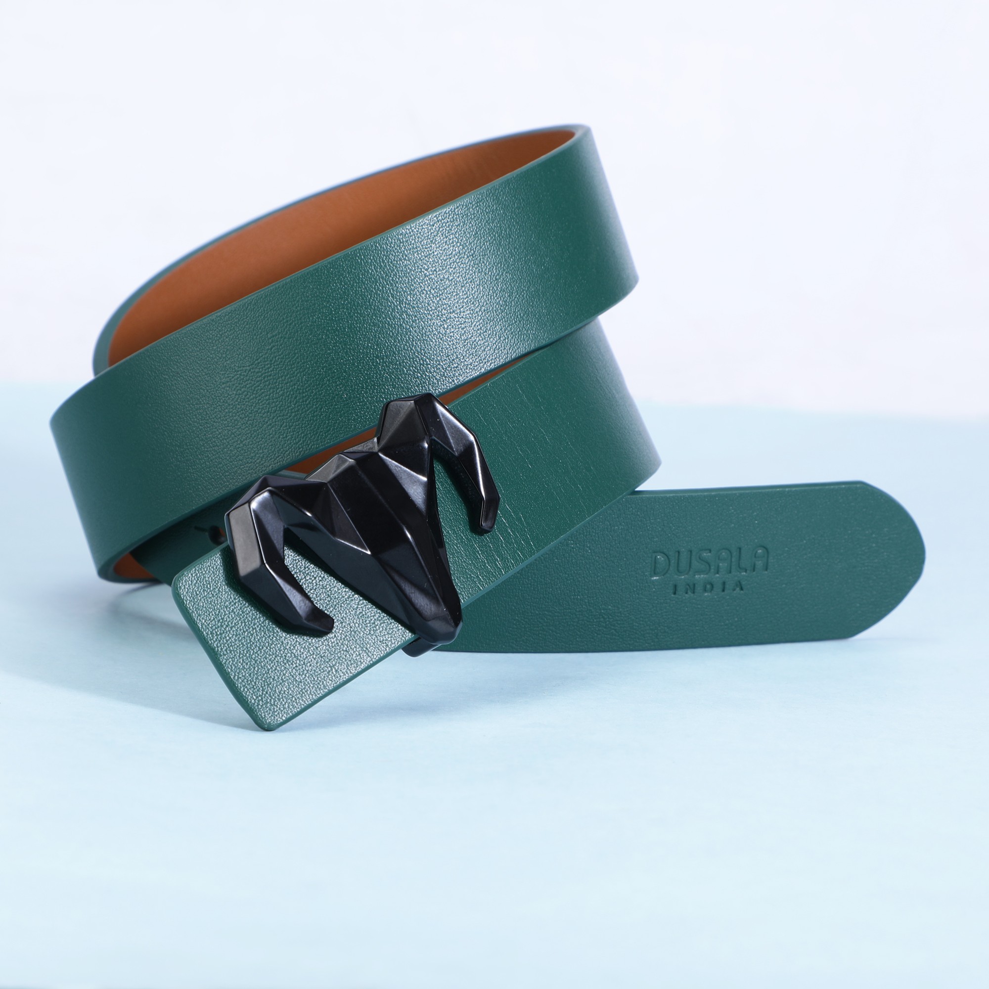 A model showcasing Italian Leather Green And Brown Reversible Belt by Dusala from Dusala's collection A model showcasing Italian Leather Green And Brown Reversible Belt by Dusala from Dusala's collection