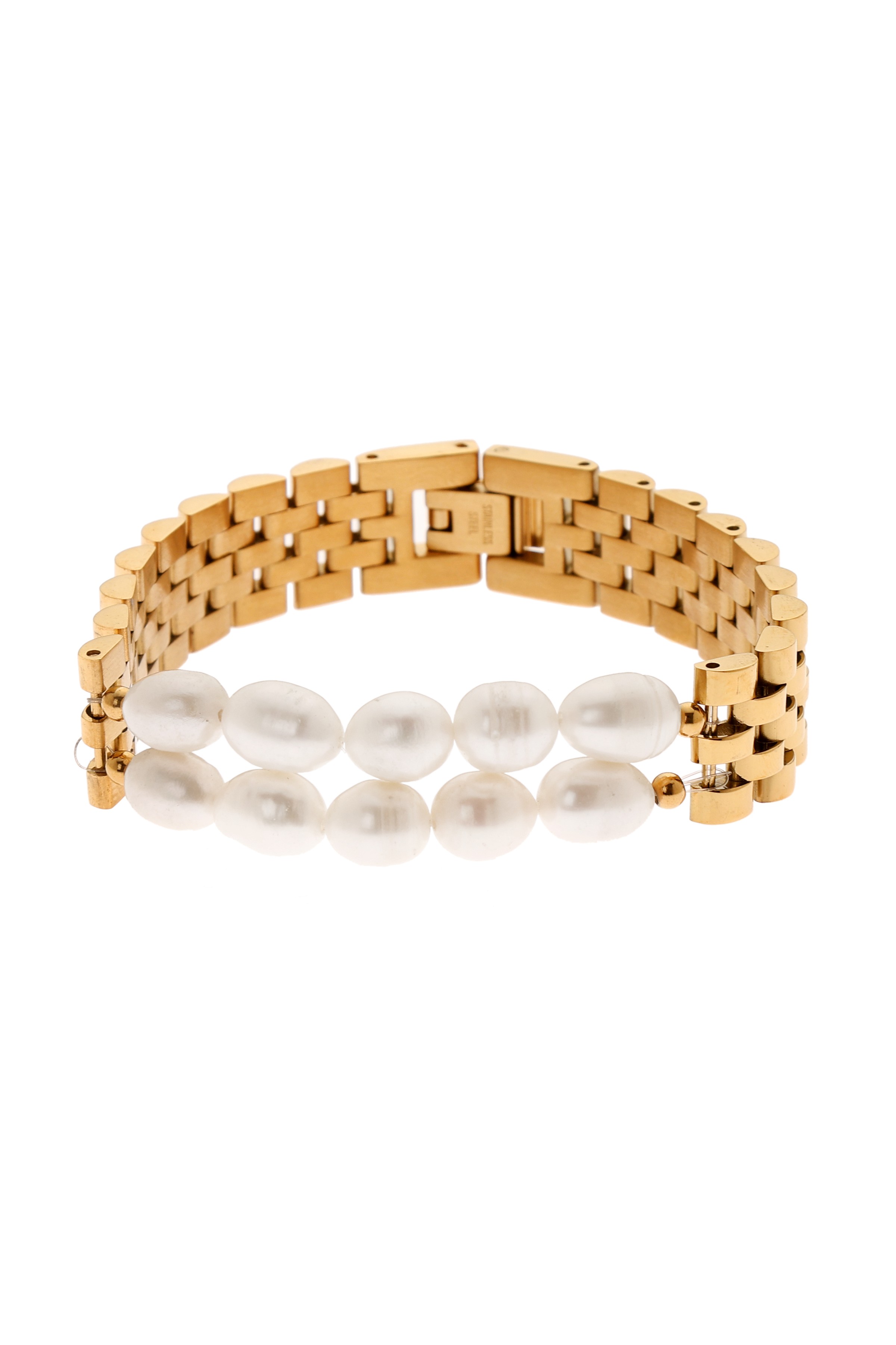 A model showcasing Cuban Luxe Bracelet by Dusala from Dusala's collection A model showcasing Cuban Luxe Bracelet by Dusala from Dusala's collection