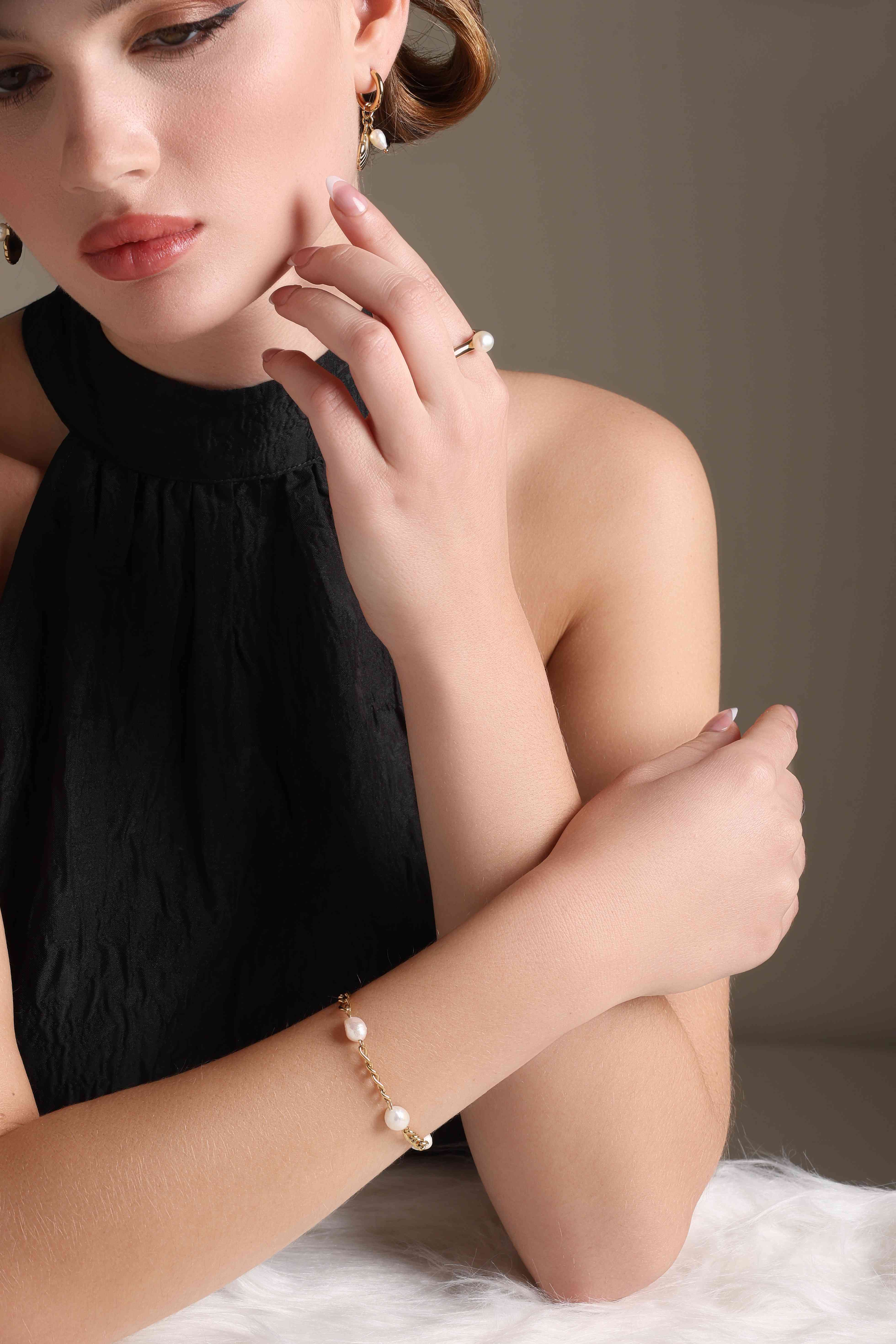 A model showcasing Everyday Glam Bracelet by Dusala from Dusala's collection A model showcasing Everyday Glam Bracelet by Dusala from Dusala's collection