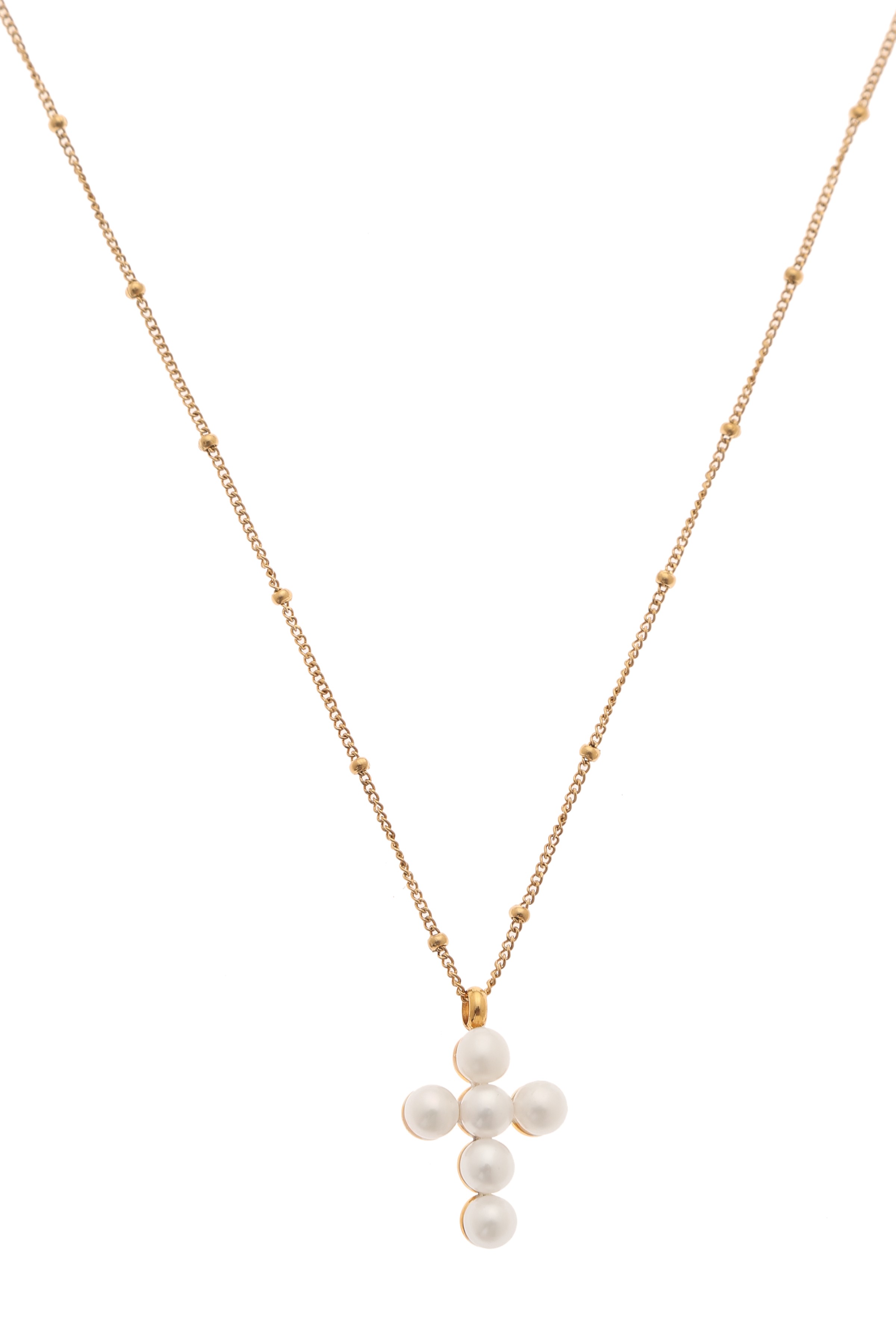 A model showcasing Cross Grace Pendant by Dusala from Dusala's collection A model showcasing Cross Grace Pendant by Dusala from Dusala's collection