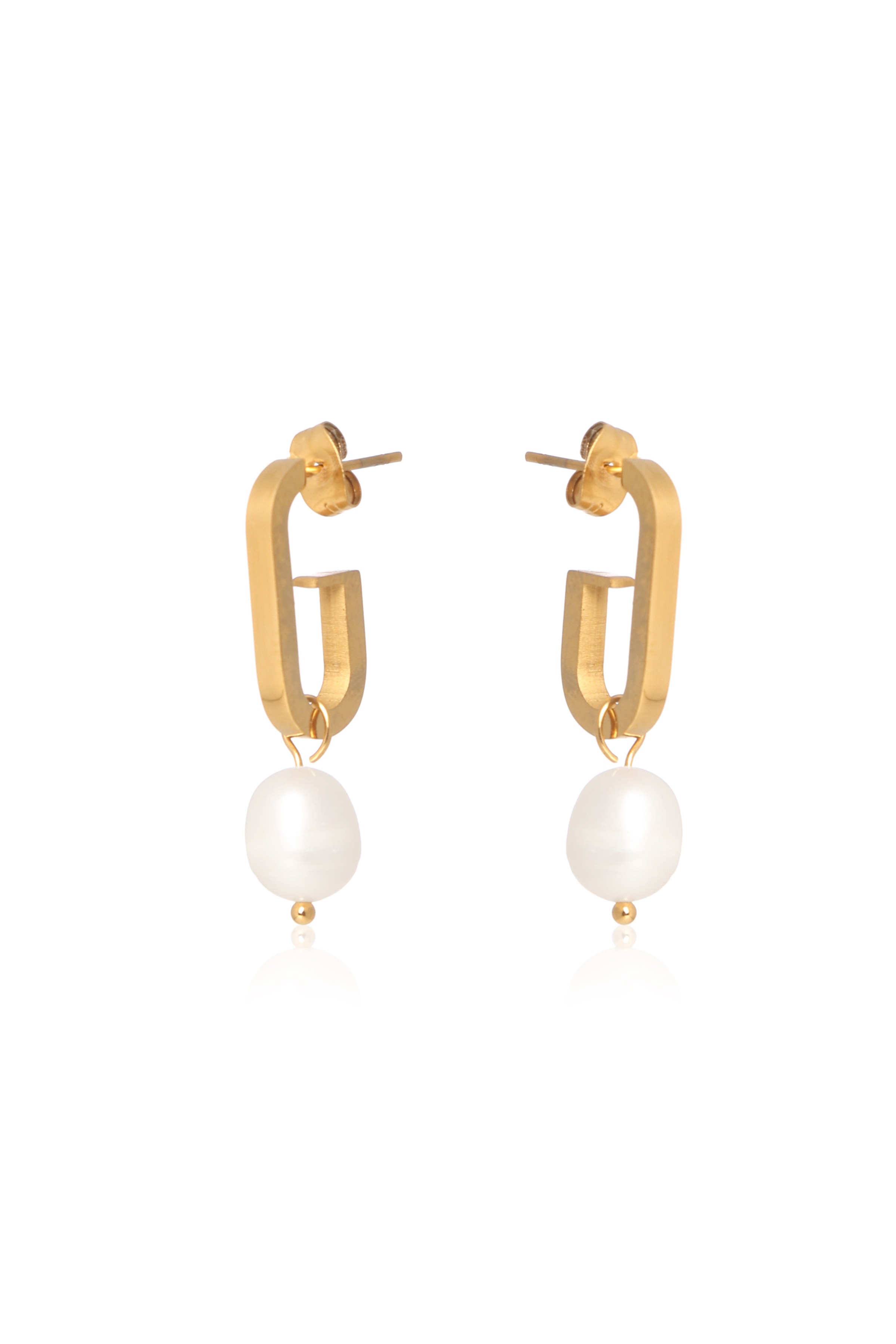A model showcasing Dangle Dream Earrings by Dusala from Dusala's collection A model showcasing Dangle Dream Earrings by Dusala from Dusala's collection