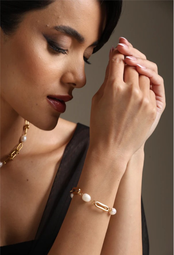 A model showcasing Everyday Elegance Bracelet by Dusala from Dusala's collection A model showcasing Everyday Elegance Bracelet by Dusala from Dusala's collection