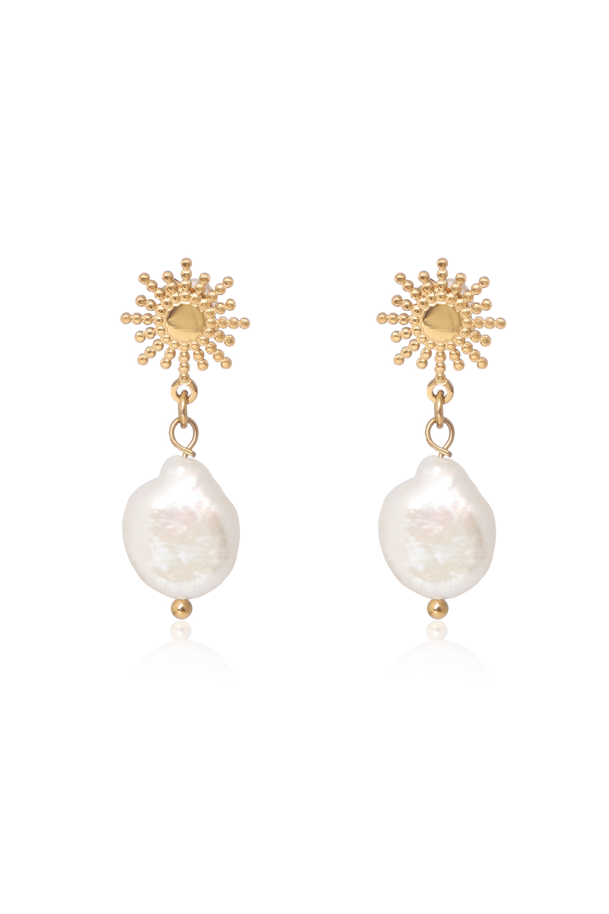 A model showcasing Snowflake Golden Earrings by Dusala from Dusala's collection