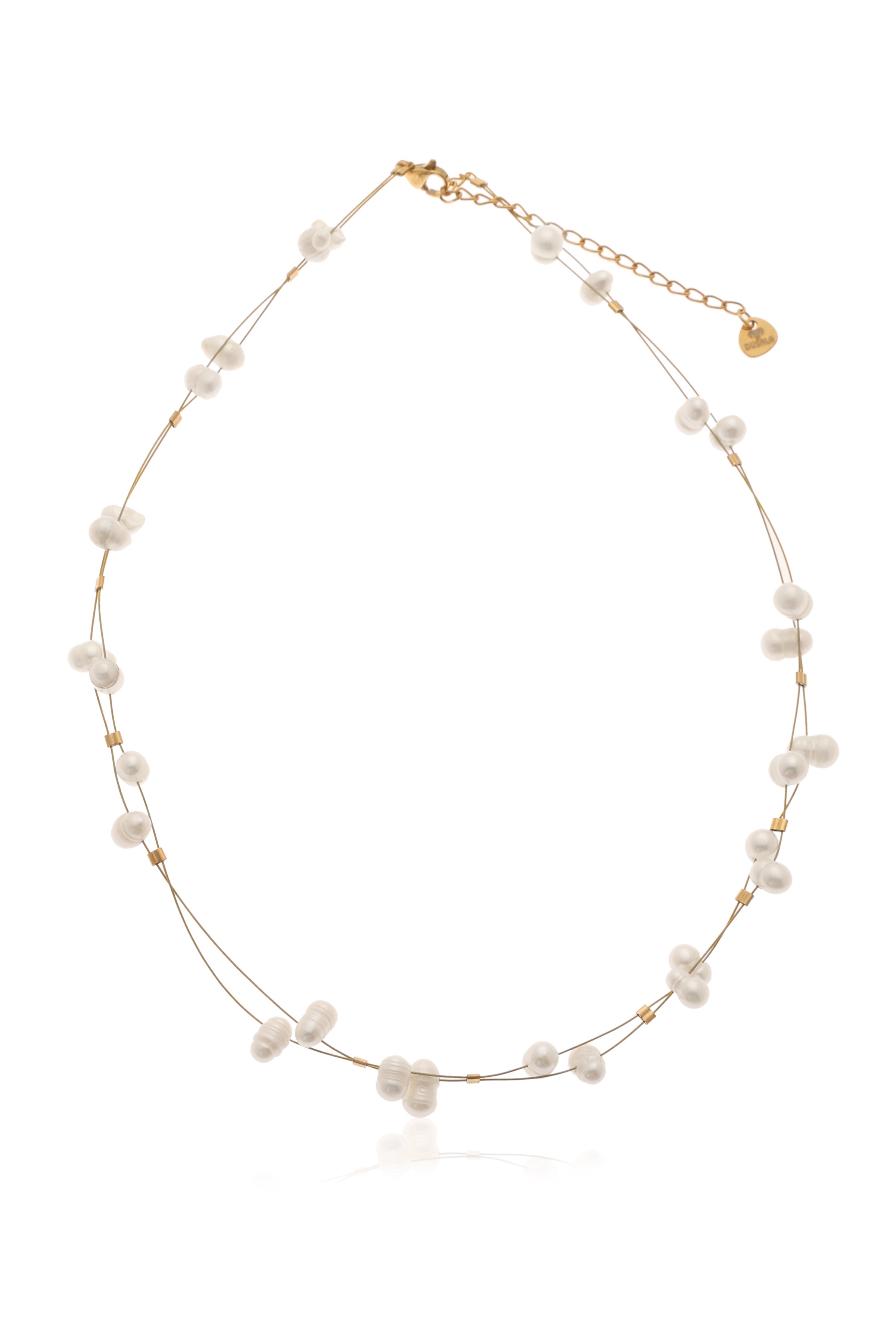 A model showcasing Pearl Elegance Chain by Dusala from Dusala's collection A model showcasing Pearl Elegance Chain by Dusala from Dusala's collection