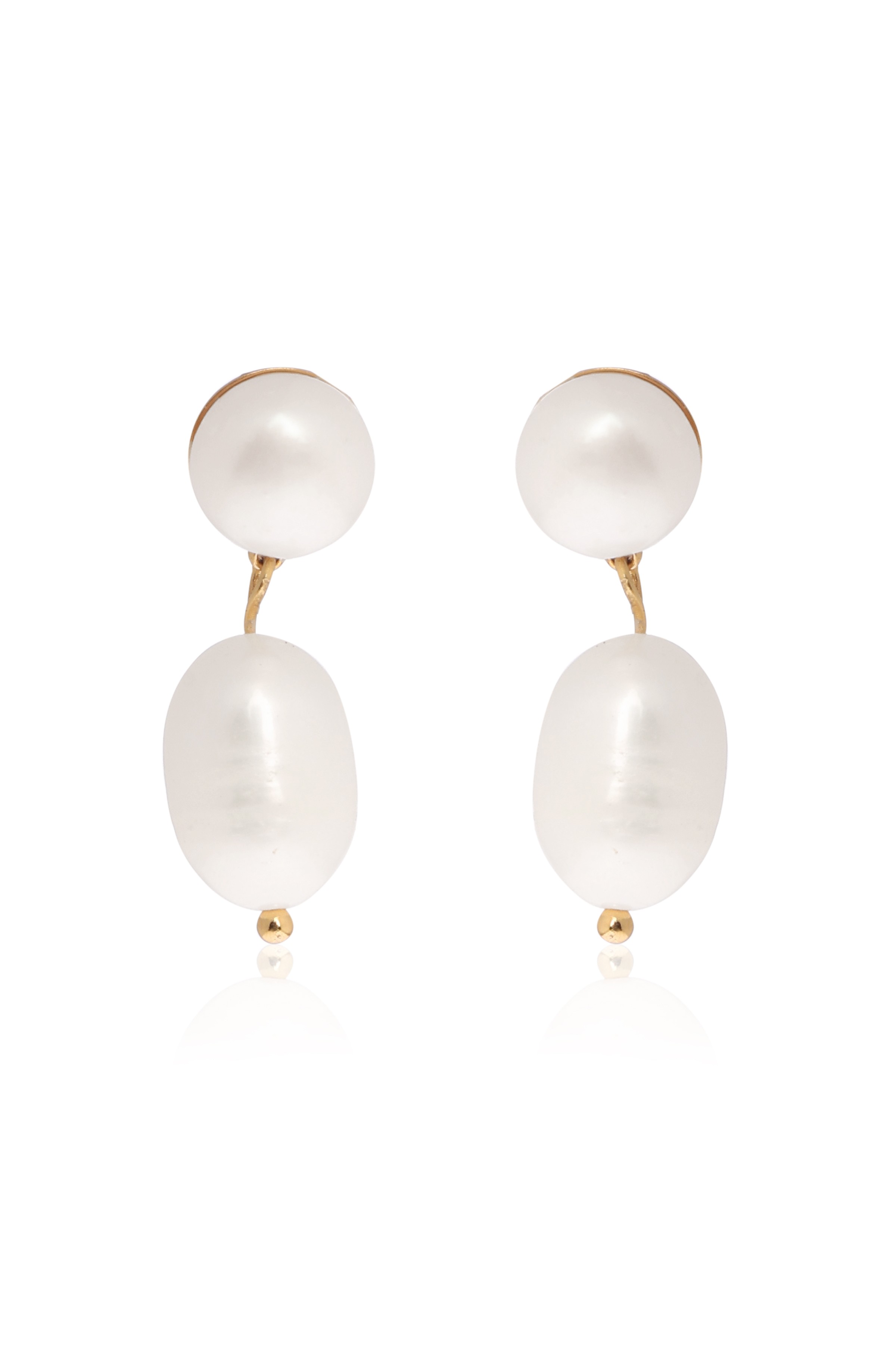 A model showcasing Daily Chic Golden Earrings by Dusala from Dusala's collection A model showcasing Daily Chic Golden Earrings by Dusala from Dusala's collection