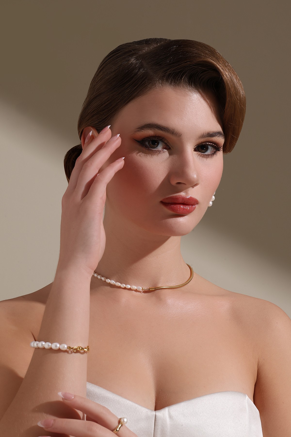 A model showcasing Collar Statement Pendant by Dusala from Dusala's collection A model showcasing Collar Statement Pendant by Dusala from Dusala's collection