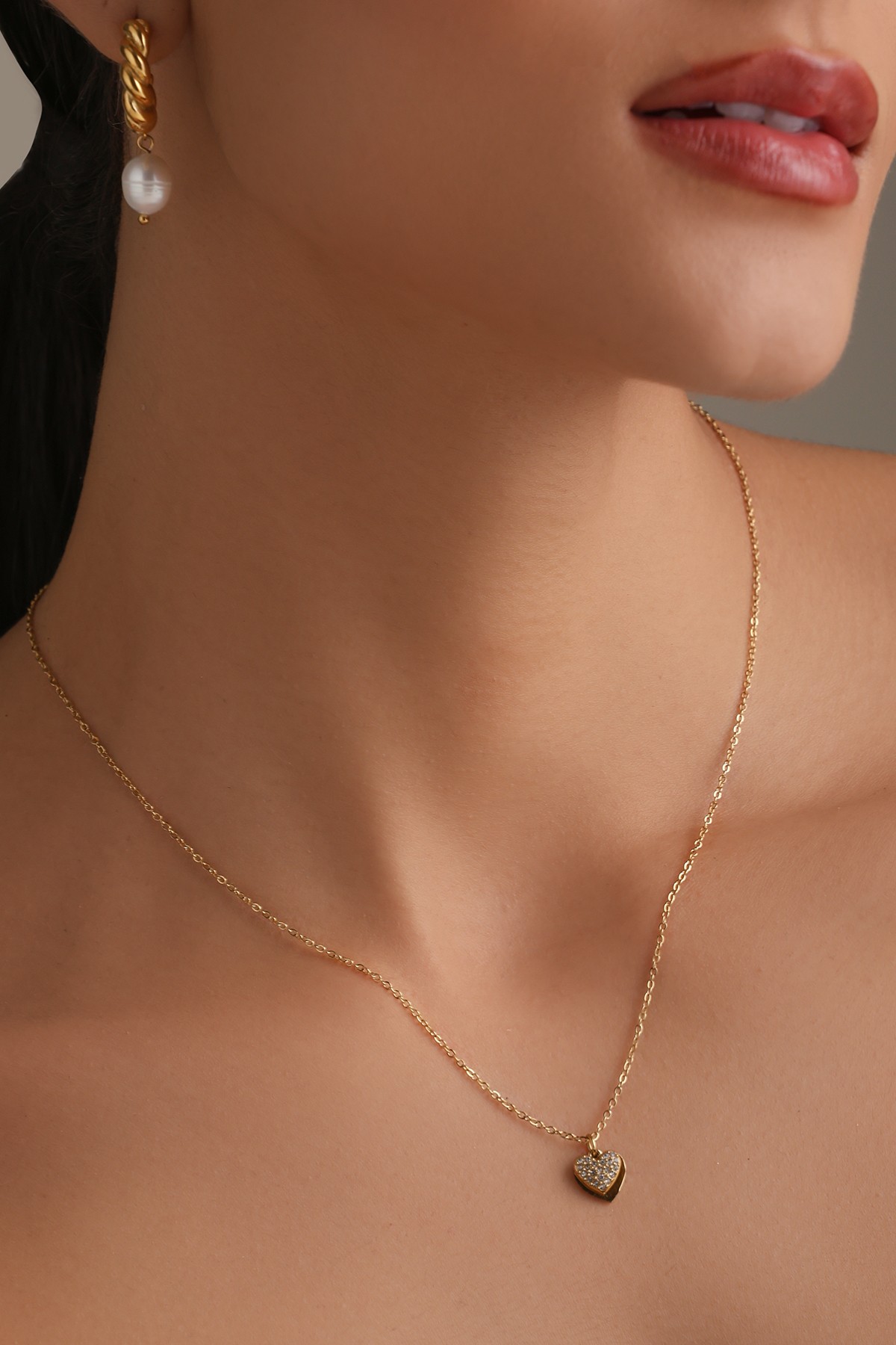 A model showcasing Heart Celebration Golden Pendant Feature image by Dusala from Dusala's collection