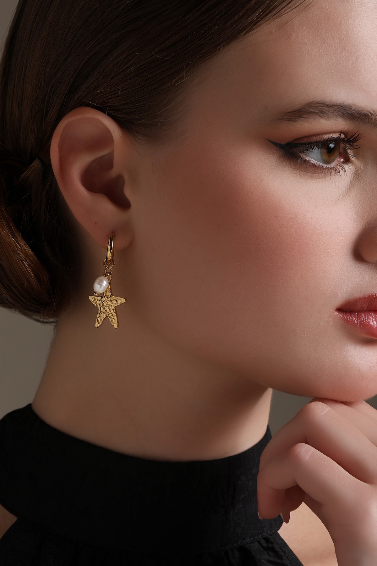A model showcasing Ocean Star Earrings Feature image by Dusala from Dusala's collection