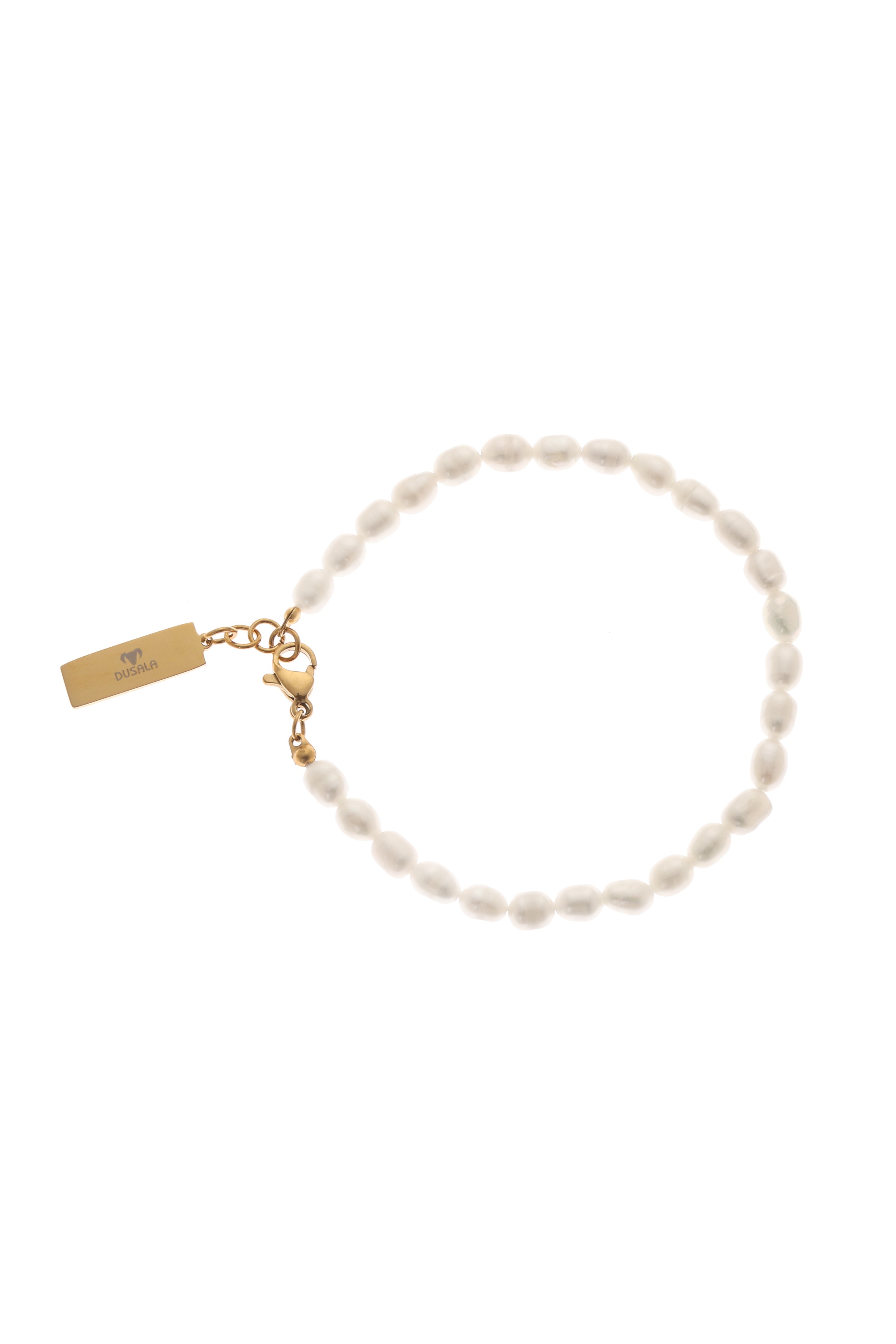 A model showcasing Love Pearl Charm Bracelet by Dusala from Dusala's collection A model showcasing Love Pearl Charm Bracelet by Dusala from Dusala's collection