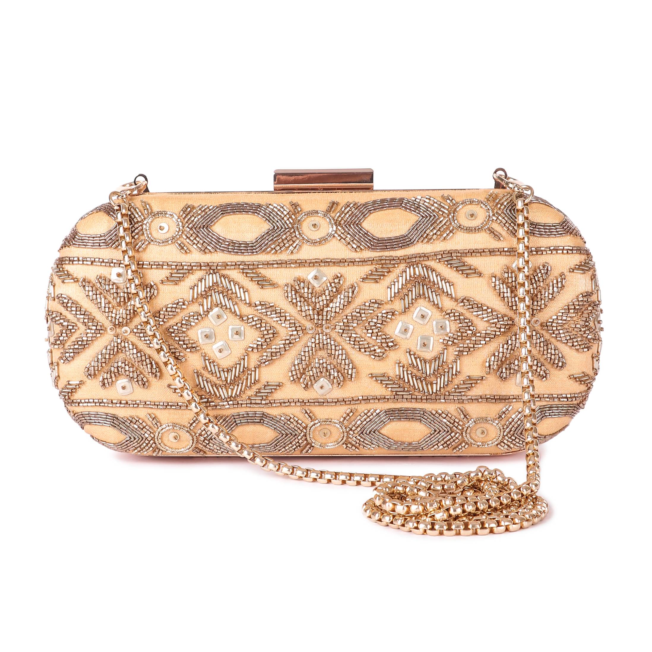 A model showcasing Geo Bold Clutch by The Purple Sack from The Purple Sack's collection