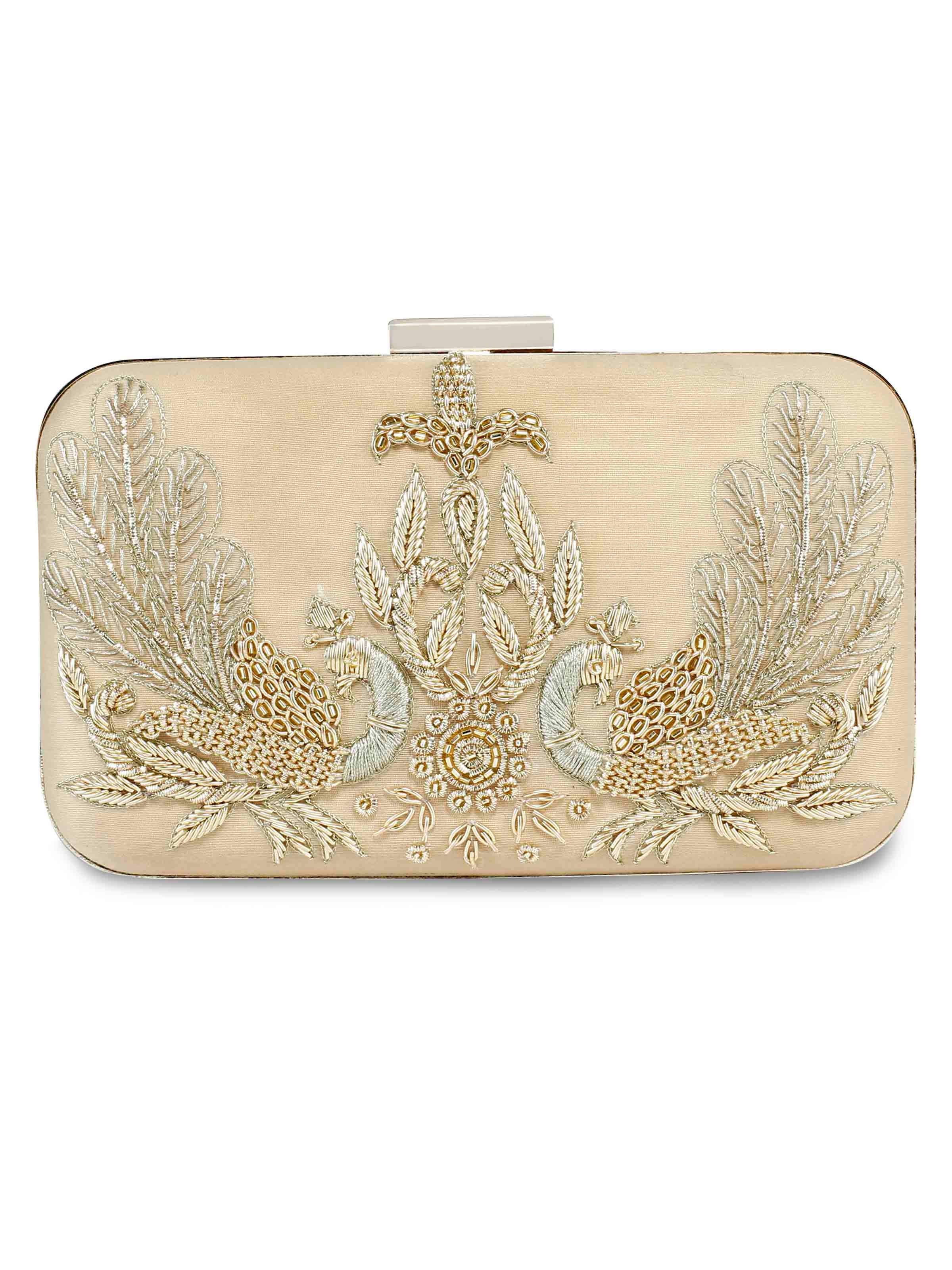 A model showcasing Golden Peacock Clutch Feature image by The Purple Sack from The Purple Sack's collection