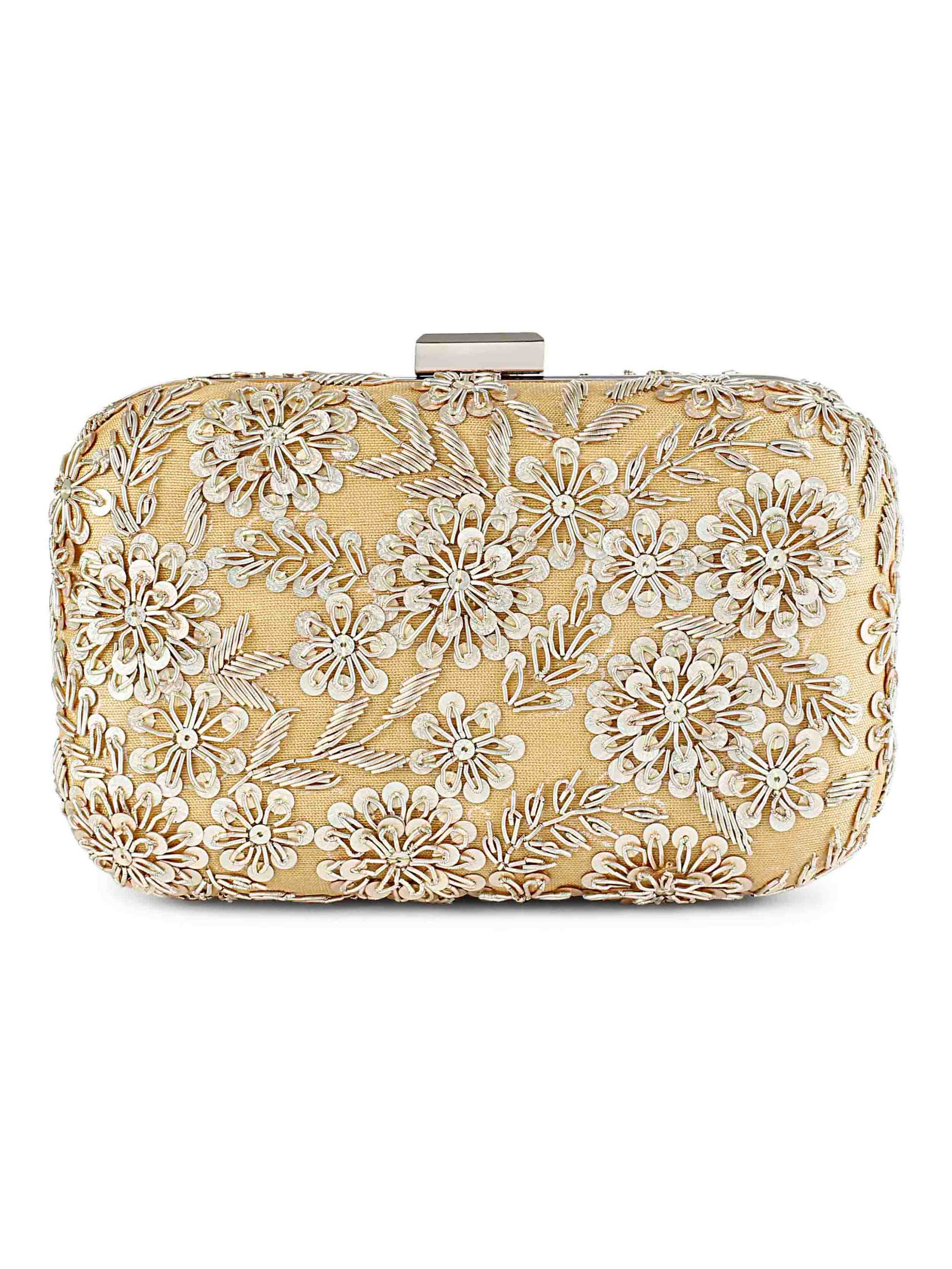 A model showcasing Golden Garden Bliss Clutch by The Purple Sack from The Purple Sack's collection