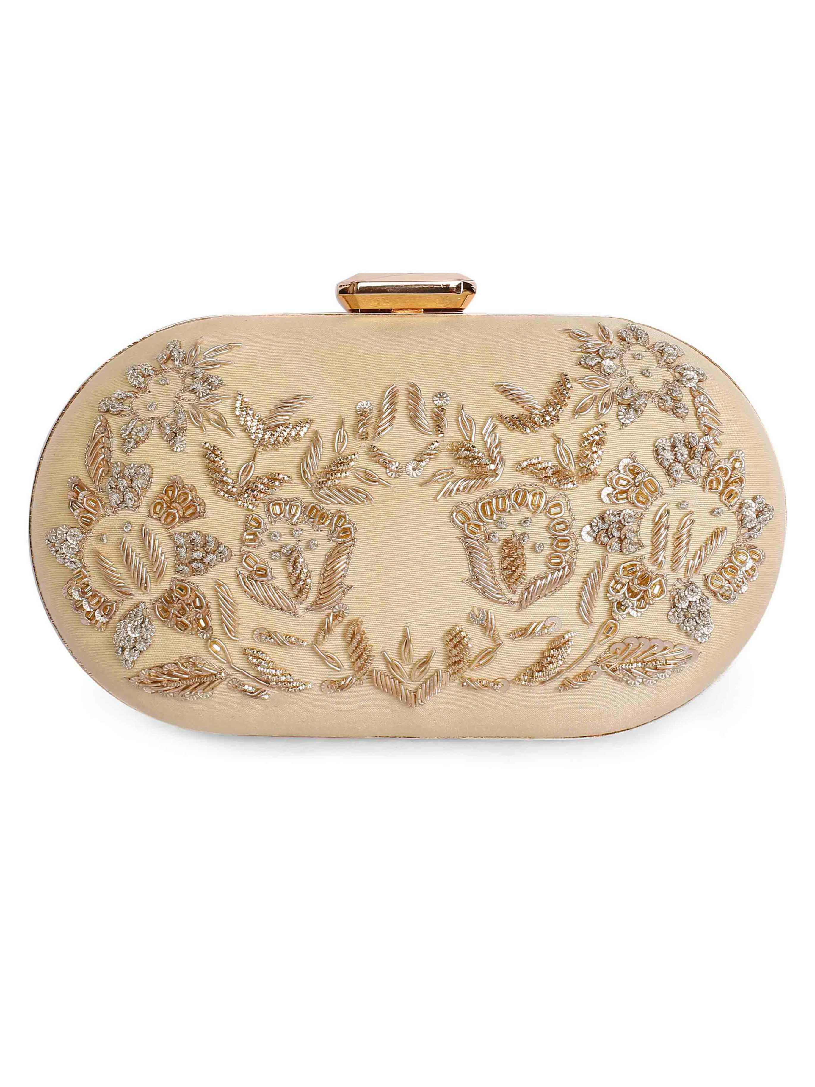 A model showcasing Zardosi Golden Oblong Clutch Feature image by The Purple Sack from The Purple Sack's collection