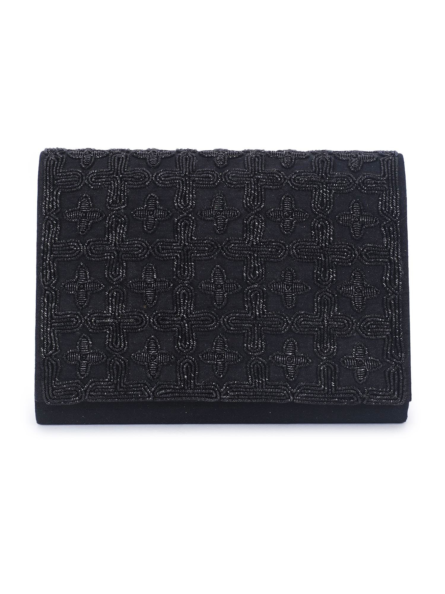 A model showcasing Black Jaal Clutch Feature image by The Purple Sack from The Purple Sack's collection