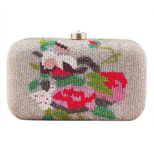 A model showcasing Beaded Clutch Feature image by The Purple Sack from The Purple Sack's collection