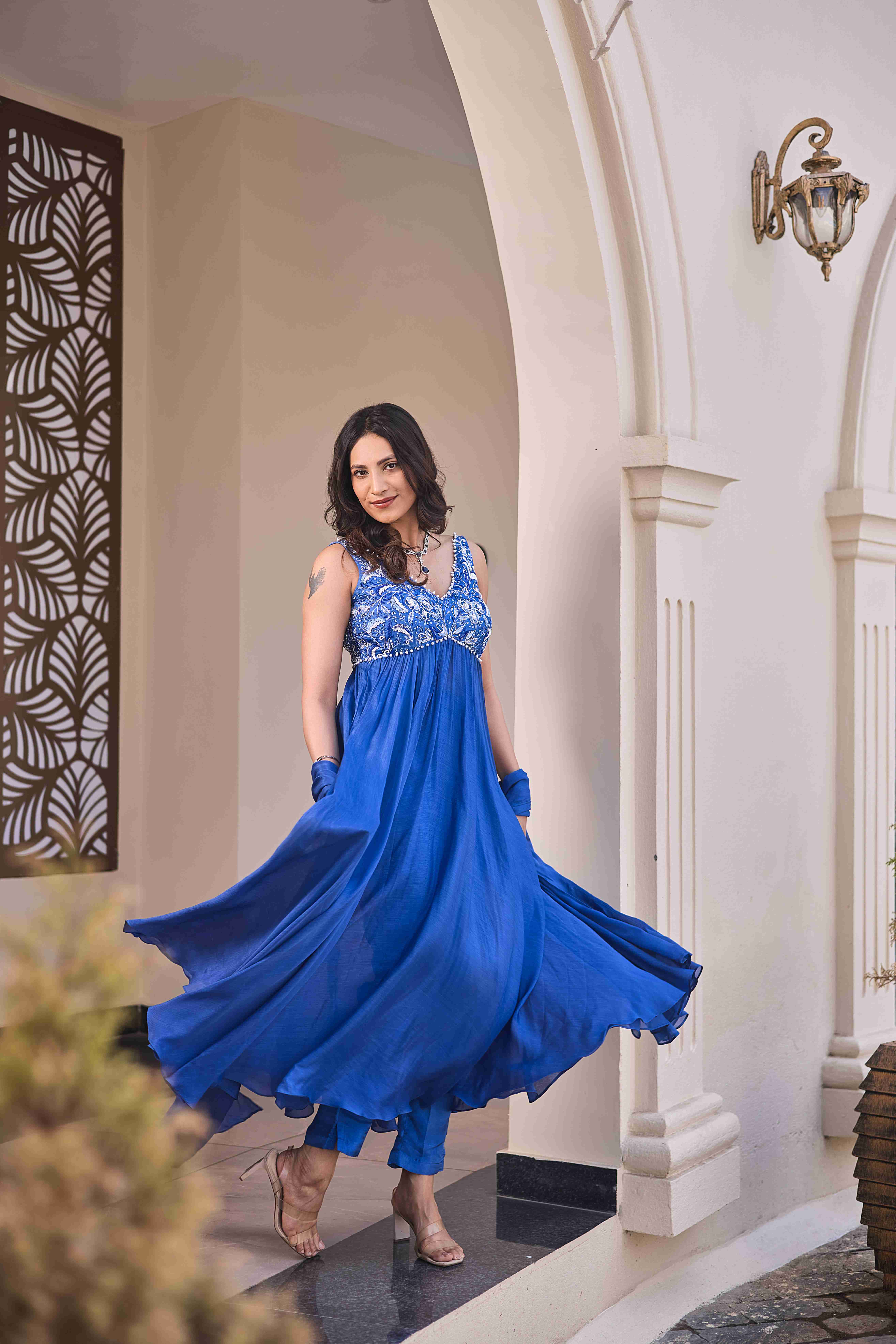 A model showcasing Timeless Affair Anarkali Set by D And V from D And V's collection