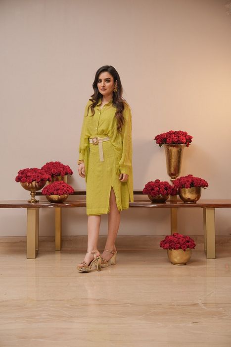 A model showcasing Lime Mukaish Coord Set by Myra By Anju Narian from Myra By Anju Narian's collection A model showcasing Lime Mukaish Coord Set by Myra By Anju Narian from Myra By Anju Narian's collection