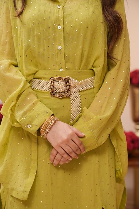 A model showcasing Lime Mukaish Coord Set by Myra By Anju Narian from Myra By Anju Narian's collection A model showcasing Lime Mukaish Coord Set by Myra By Anju Narian from Myra By Anju Narian's collection