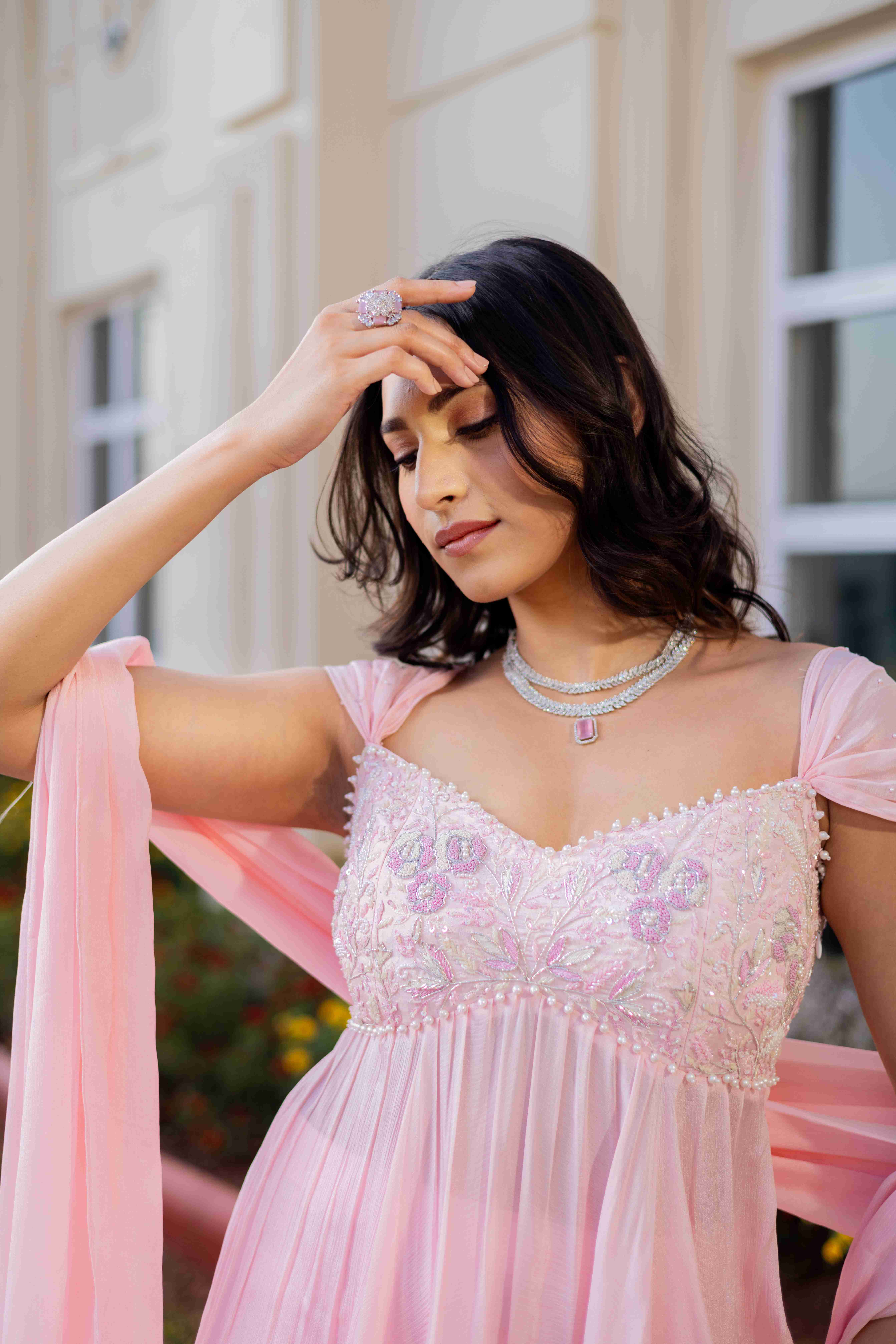 A model showcasing Almost A Dream Sharara Suit by D And V from D And V's collection
