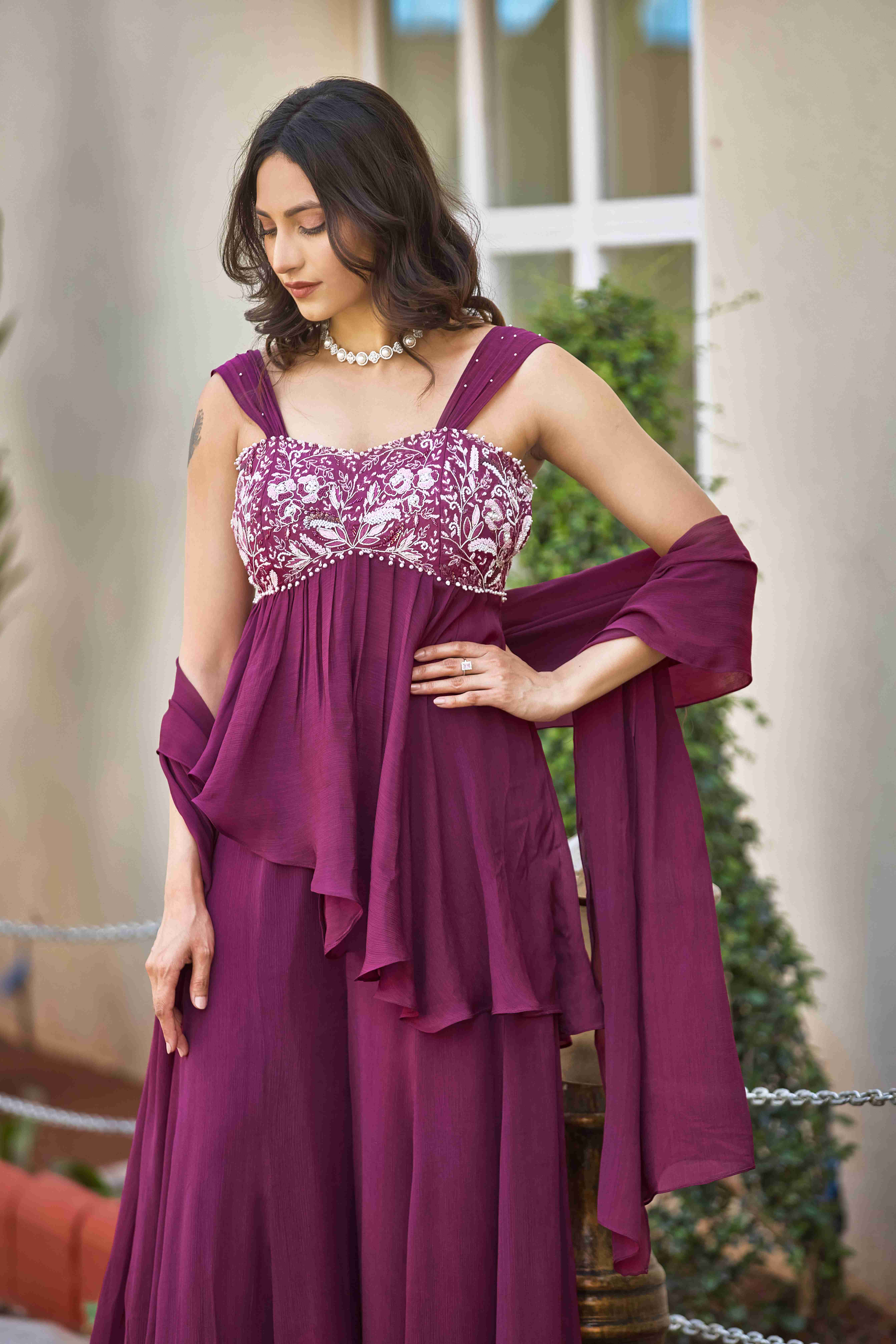 A model showcasing Stardust Secrets Sharara Suit by D And V from D And V's collection