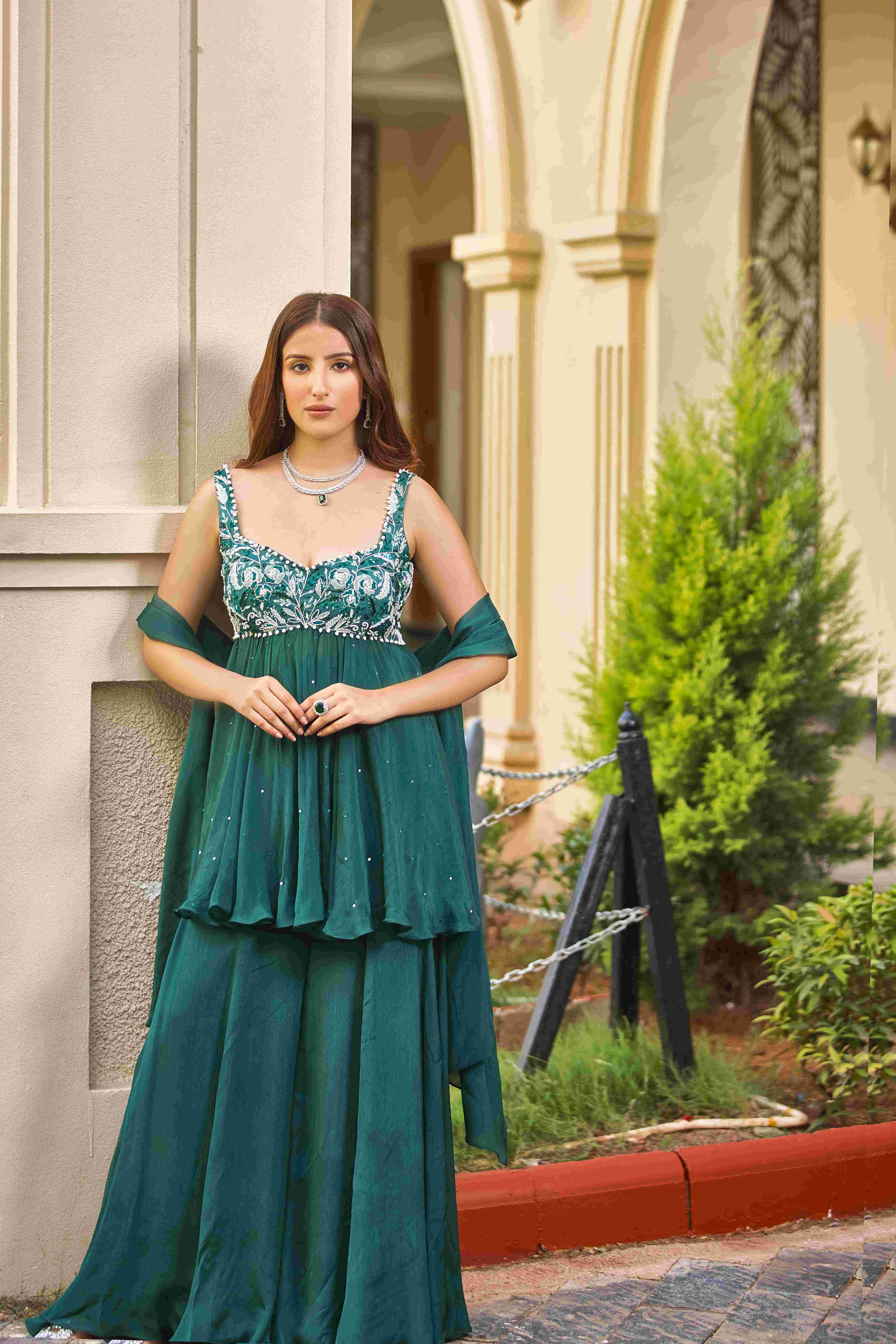 A model showcasing Stealing Glances Sharara Suit by D And V from D And V's collection