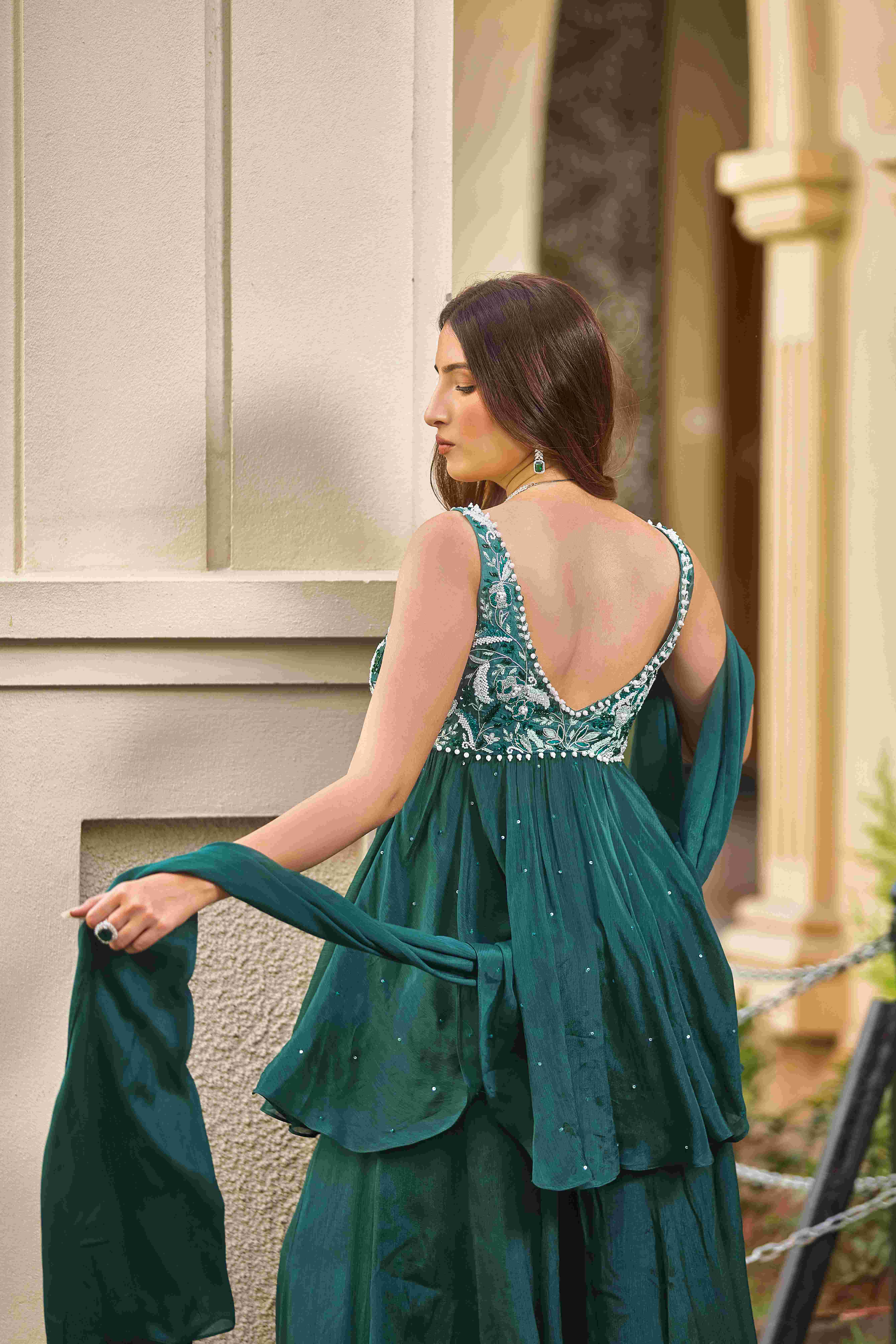A model showcasing Stealing Glances Sharara Suit by D And V from D And V's collection