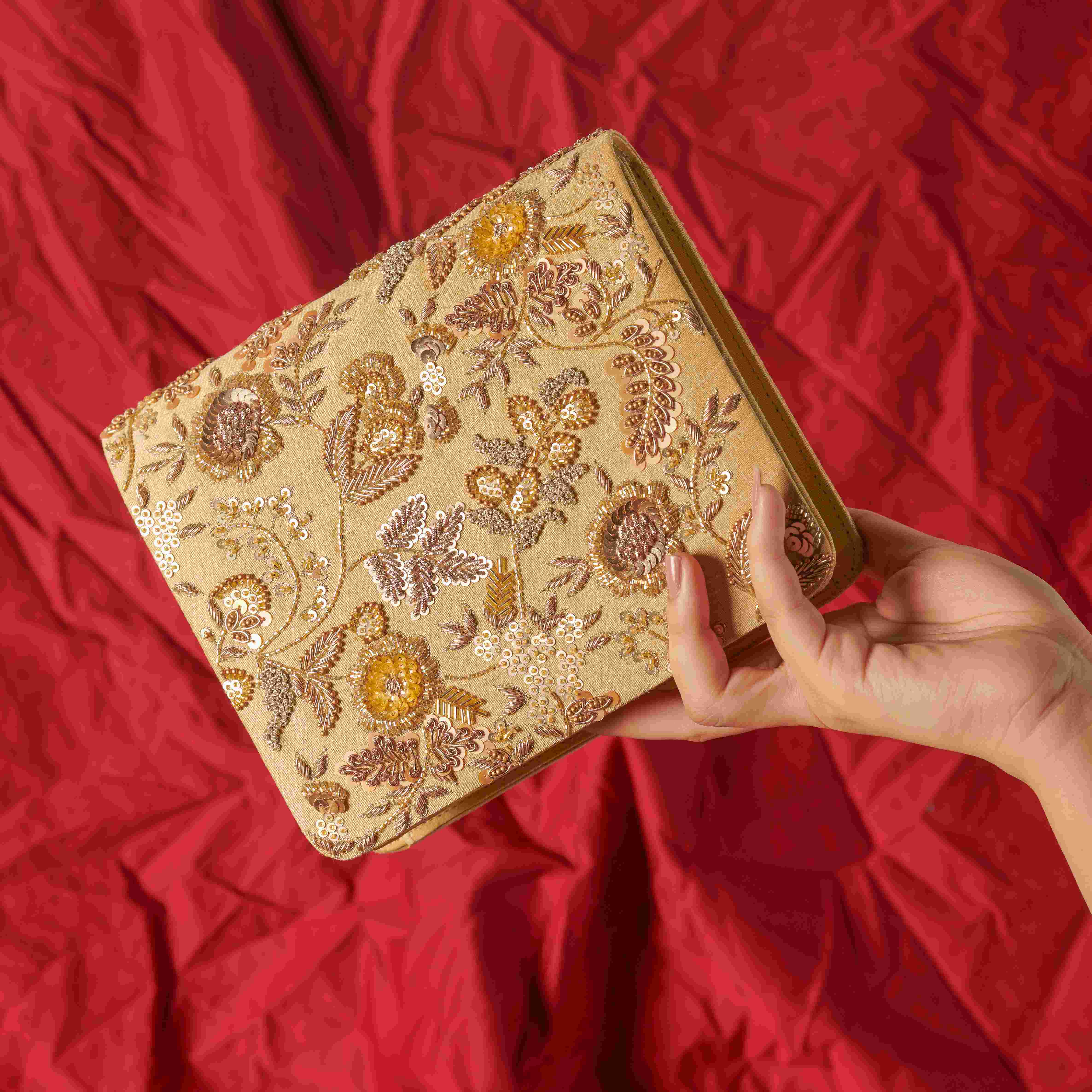 A model showcasing Shiddat Clutch Feature image by The Purple Sack from The Purple Sack's collection