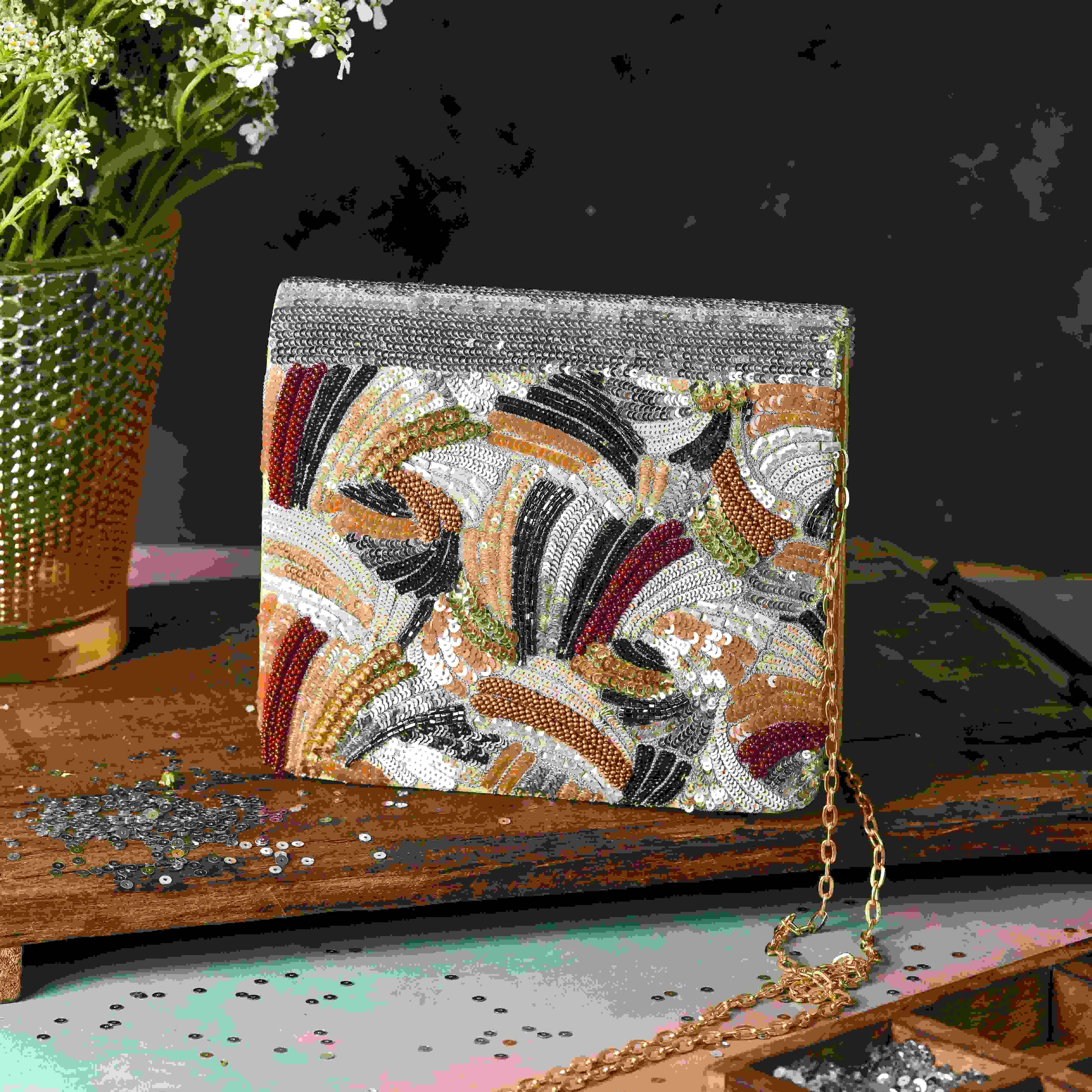 A model showcasing Vasl Clutch Feature image by The Purple Sack from The Purple Sack's collection