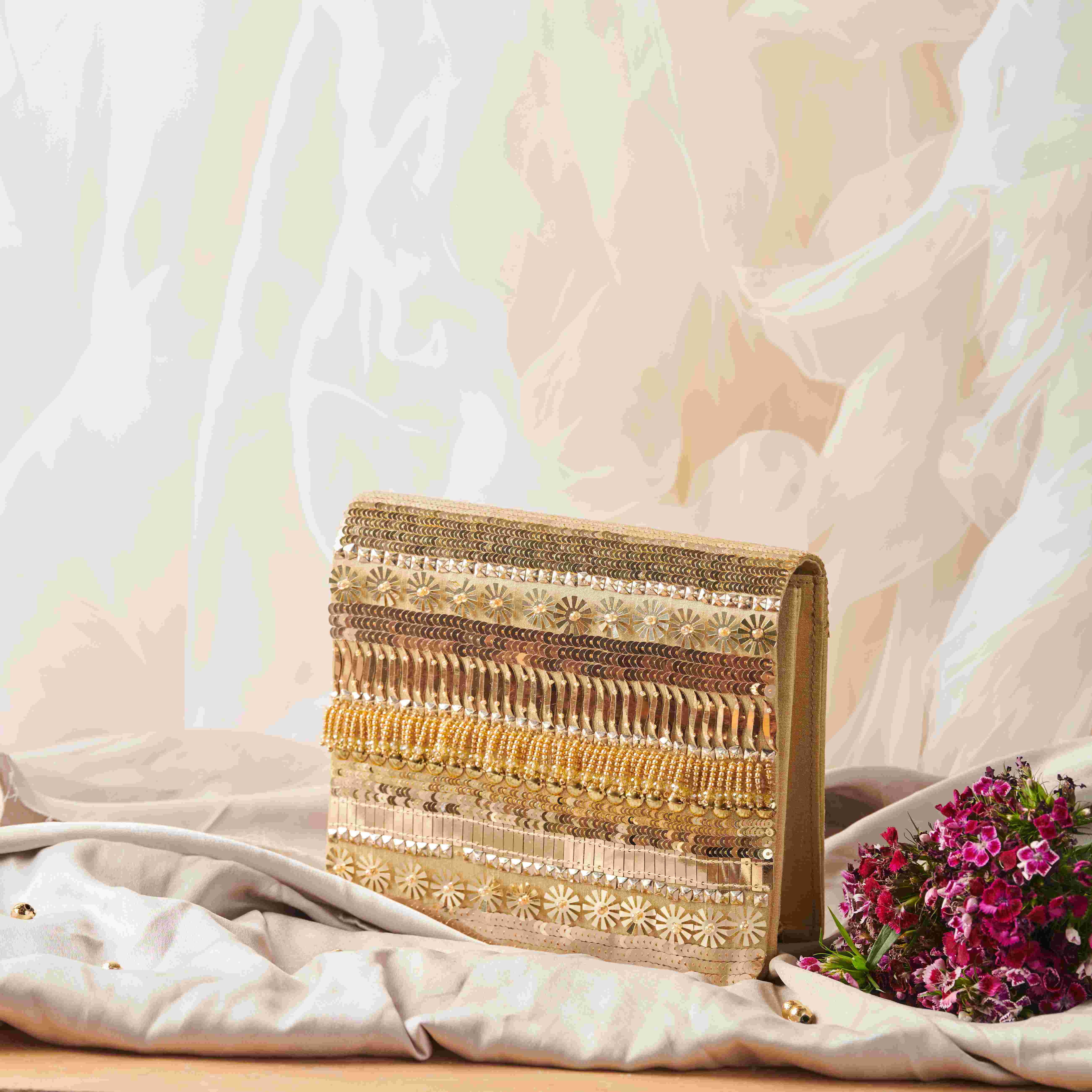 A model showcasing Inaayat Clutch Feature image by The Purple Sack from The Purple Sack's collection