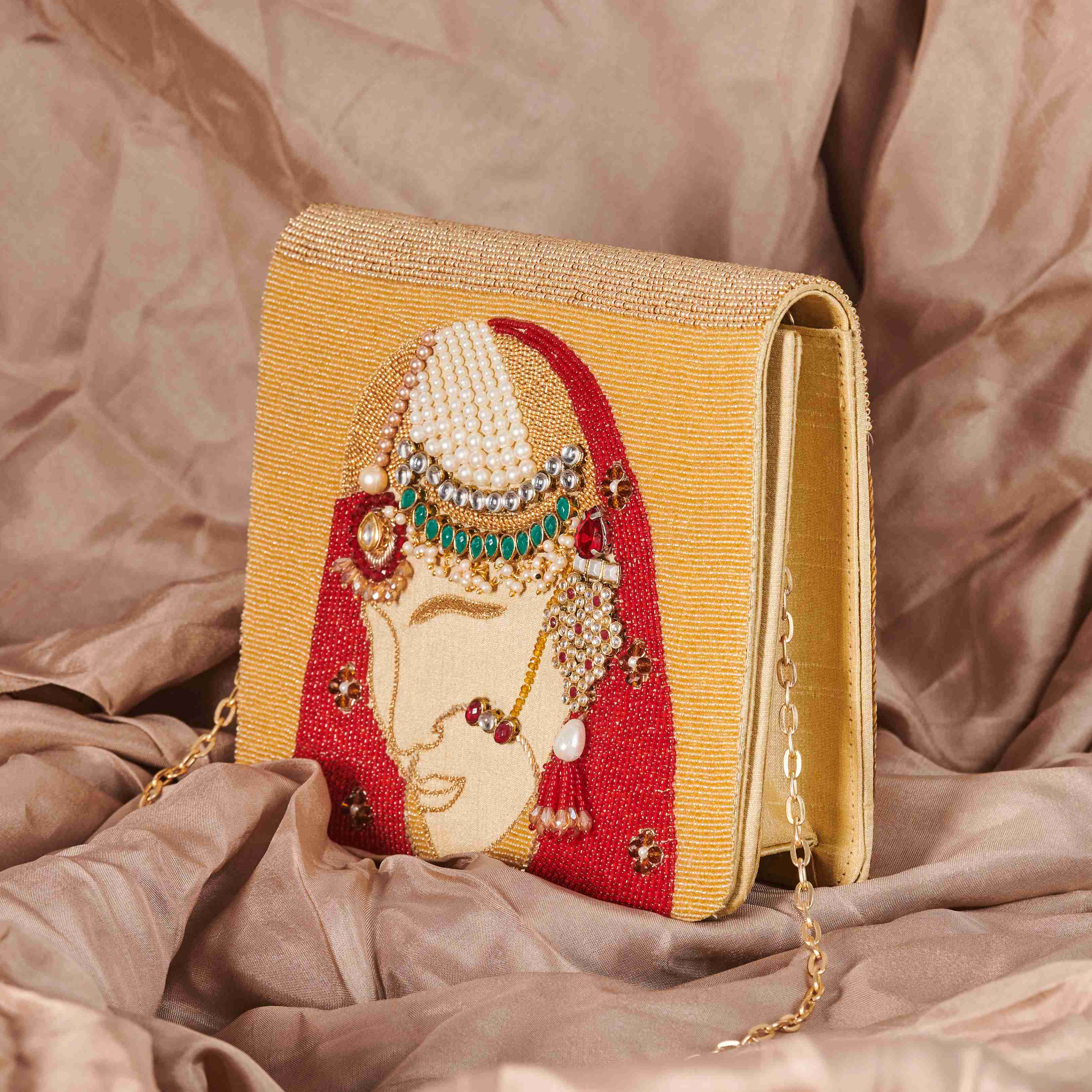 A model showcasing Dulhan Clutch by The Purple Sack from The Purple Sack's collection