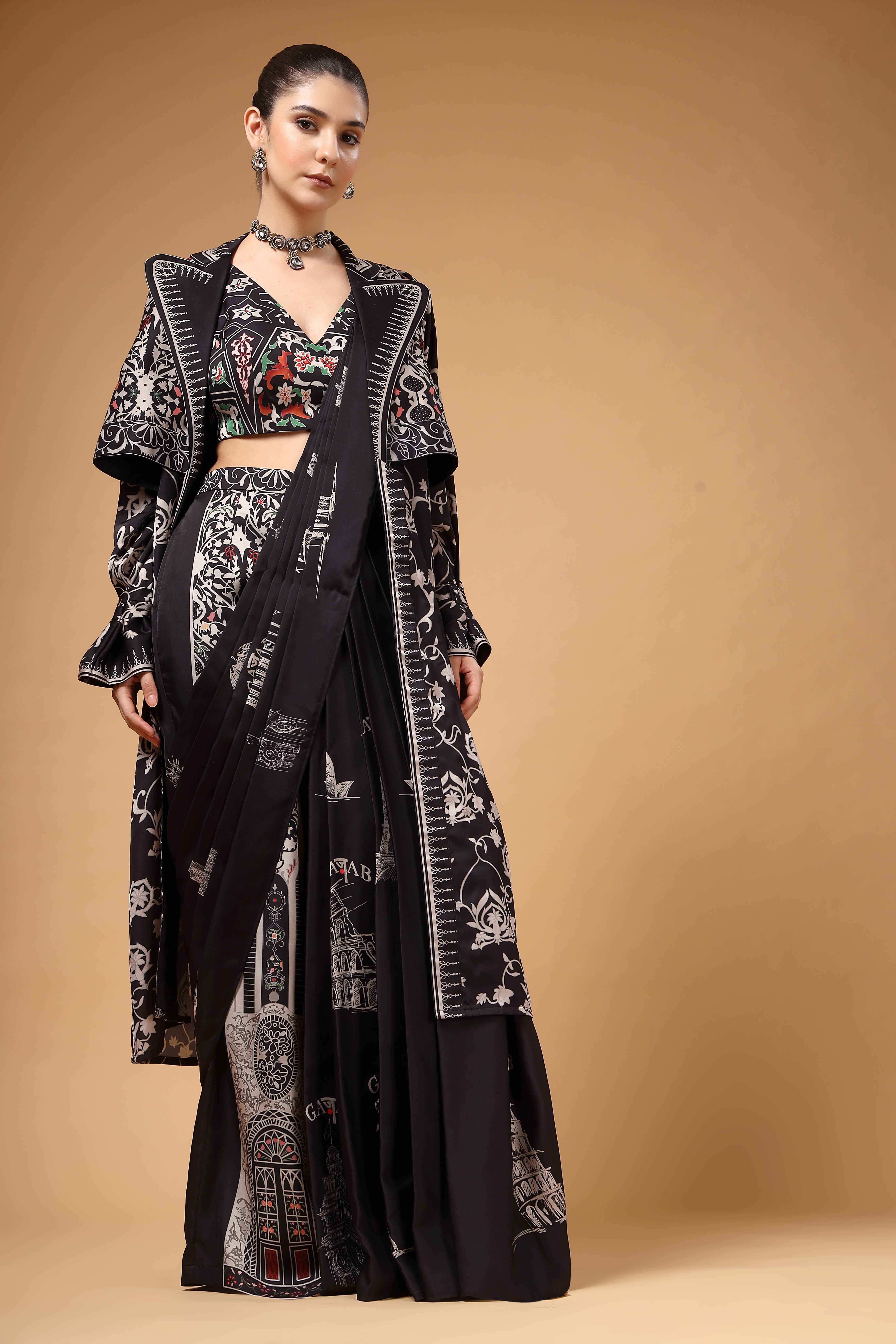A model showcasing Nyrah Black Pant Drape Saree by Miku Kumar from Miku Kumar's collection